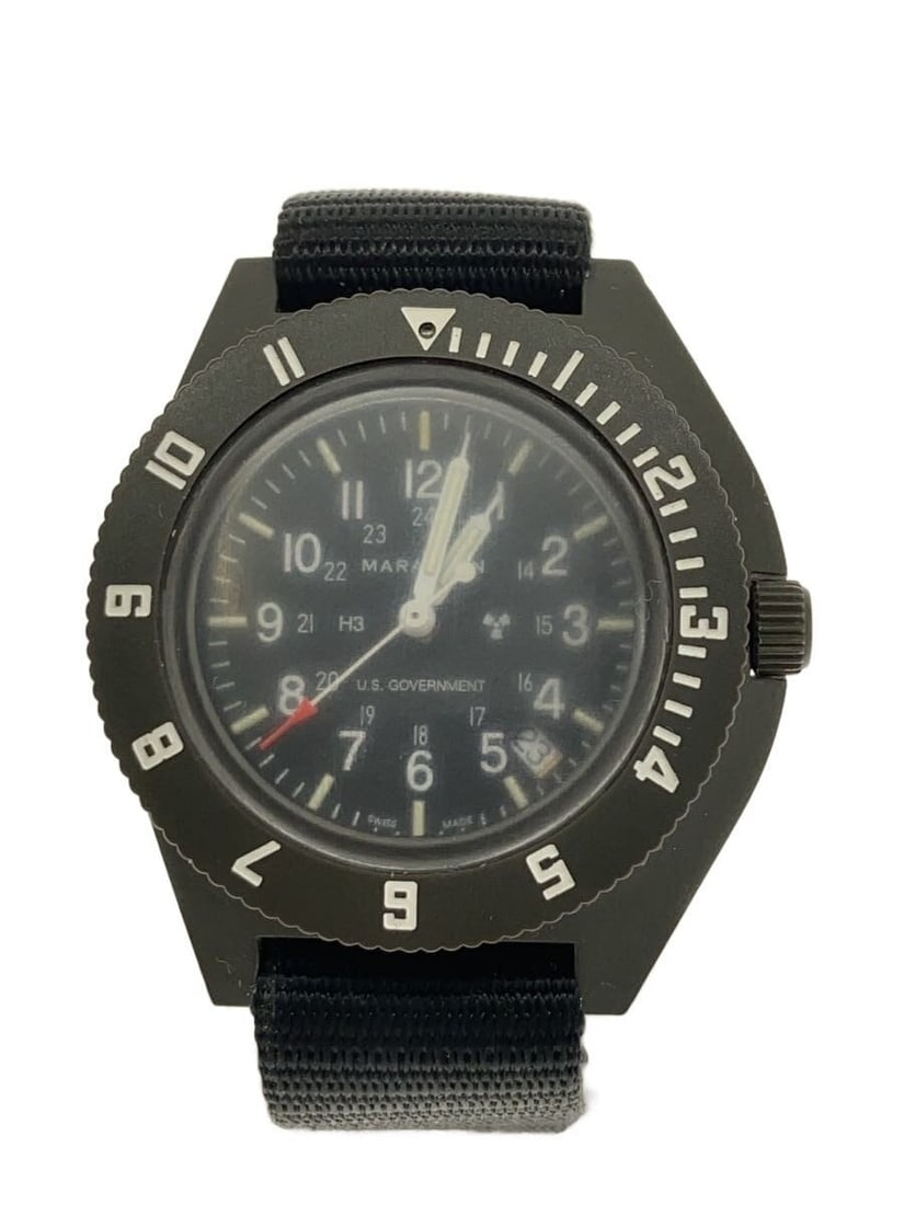 Marathon Swiss Men's Quartz Wristwatch 6645-01-544-9475: Marathon Swiss Men's Quartz Wristwatch 6645-01-544-9475 This MARATHON Quartz 6645-01-544-9475 men's wristwatch features a Swiss-made design with a classic round case. The watch is pre-owned and graded