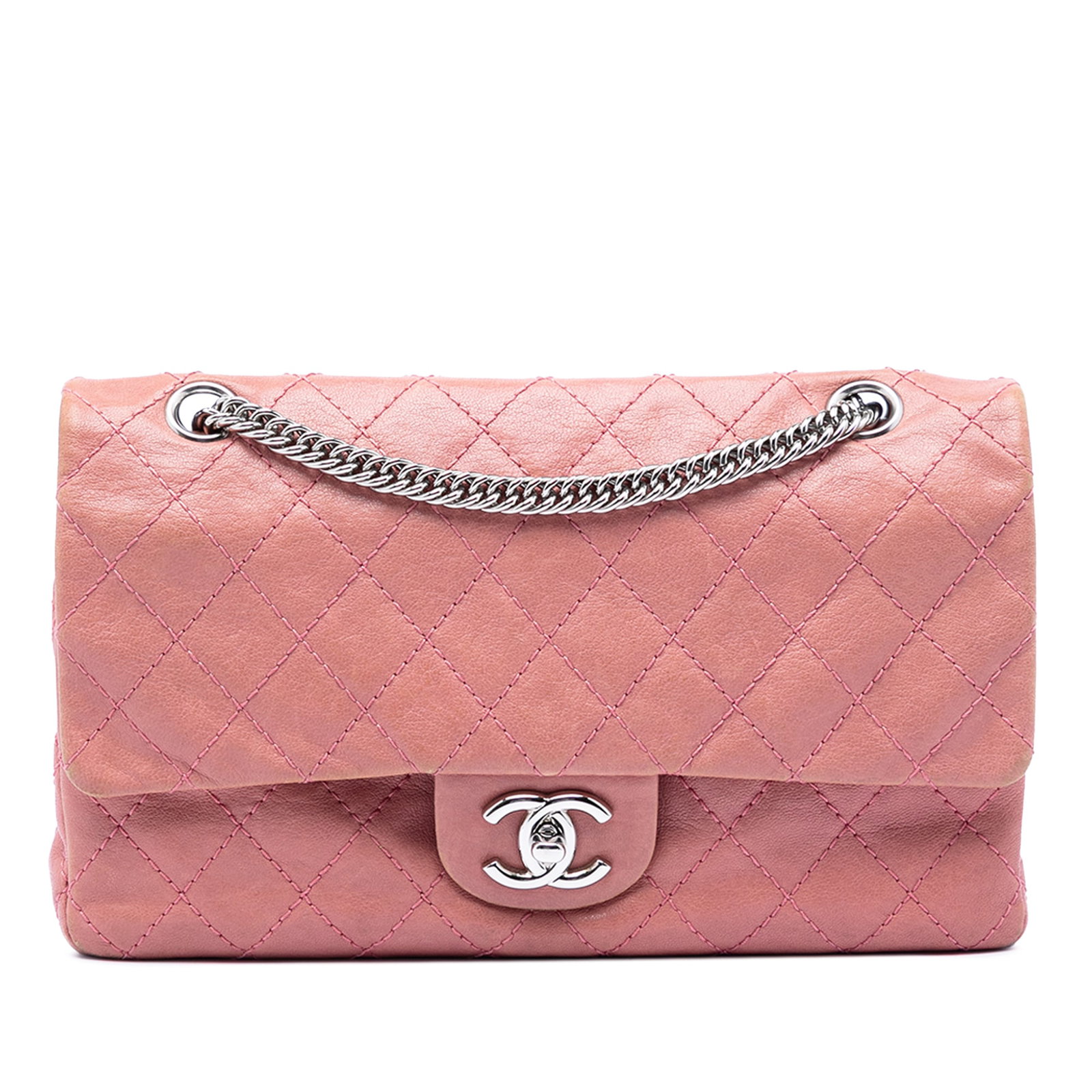 Chanel Pink Quilted Lambskin Double Flap Shoulder Bag: Chanel Pink Quilted Lambskin Double Flap Shoulder Bag This Chanel Medium Classic shoulder bag is crafted from pink washed lambskin leather and features the iconic quilted design. It is equipped with c