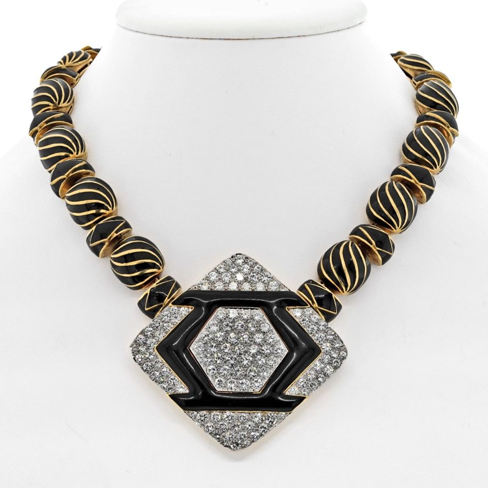 David Webb Platinum 18K Gold Onyx Diamond Enamel Necklace: David Webb Platinum 18K Gold Onyx Diamond Enamel Necklace This exquisite necklace exemplifies Manhattan minimalism, featuring a stunning combination of platinum and 18K yellow gold. With a substantial