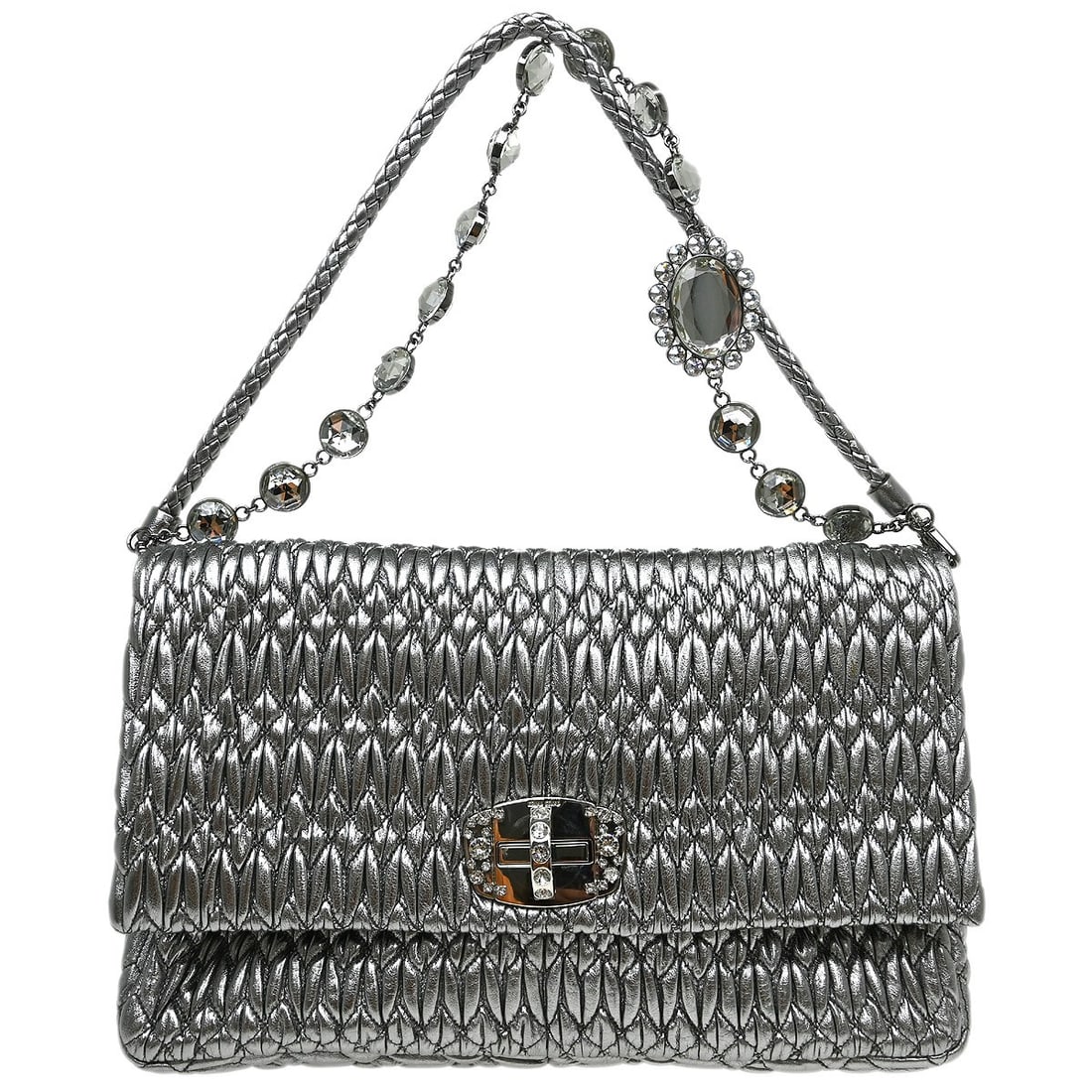 Miu Miu Silver Leather Nappa Matelasse Bag: Miu Miu Silver Leather Nappa Matelasse Bag This Miu Miu Nappa Matelasse bag is crafted from silver leather and features the brand's signature quilted design. Designed for unisex use, it offers a styli