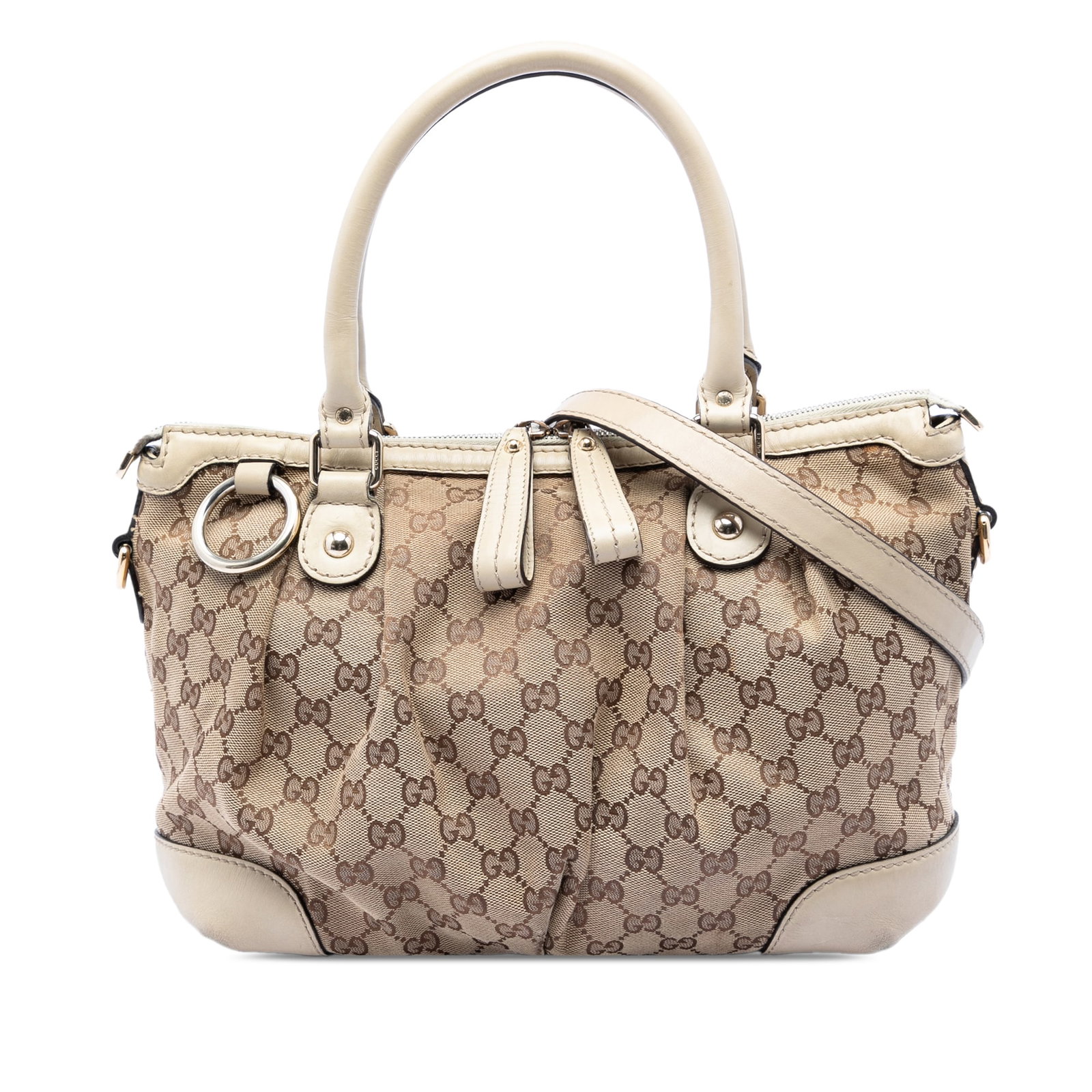 Gucci GG Canvas Beige Sukey Satchel Bag: Gucci GG Canvas Beige Sukey Satchel Bag This Gucci GG Canvas Sukey Satchel features a beige canvas body with leather trim, rolled leather handles, a flat leather strap, and a top zip closure. The inte