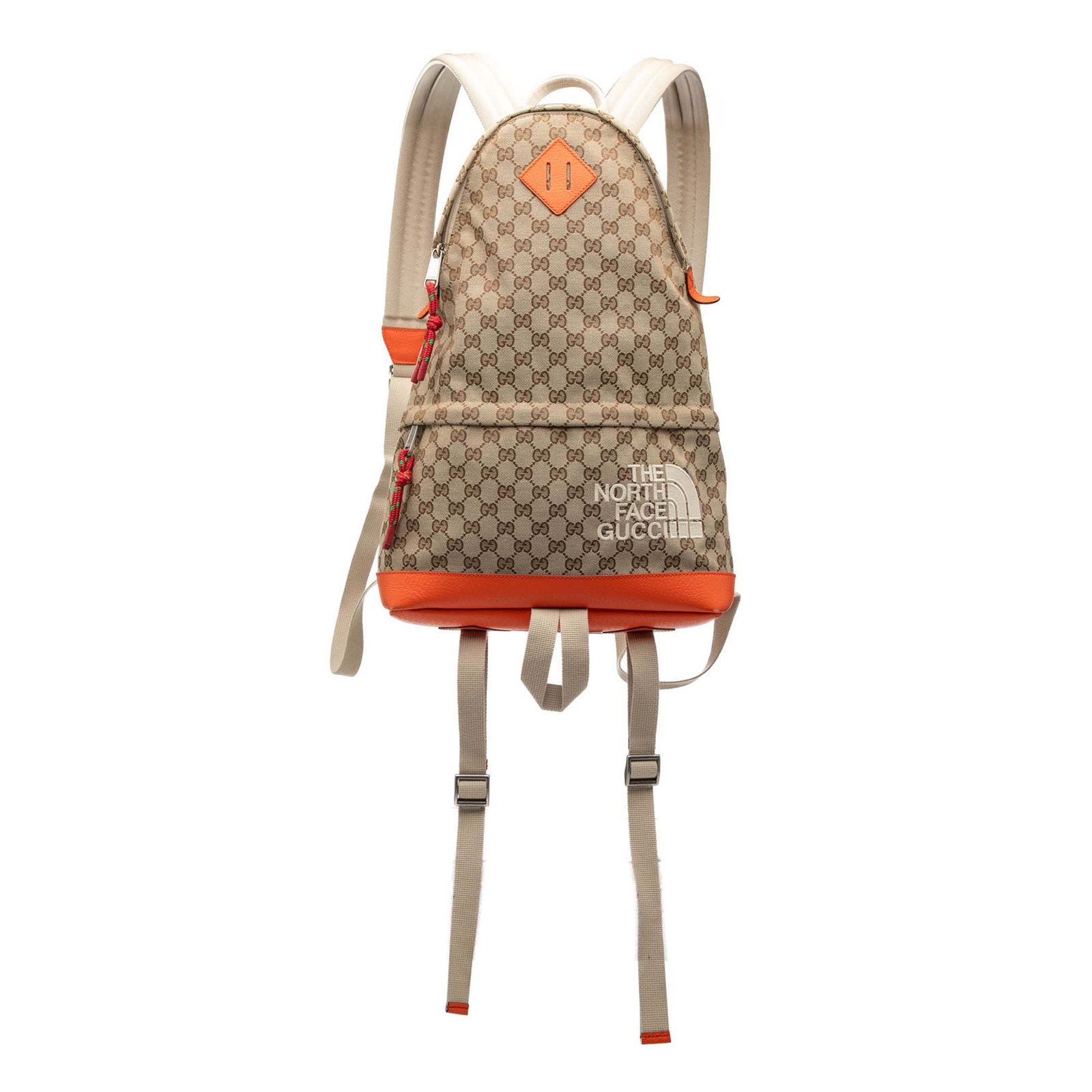 Gucci The North Face GG Canvas Medium Backpack: Gucci The North Face GG Canvas Medium Backpack This Gucci The North Face Medium GG Canvas Backpack is crafted in Italy and features a beige canvas body with leather trim. It offers a flat top handle, 