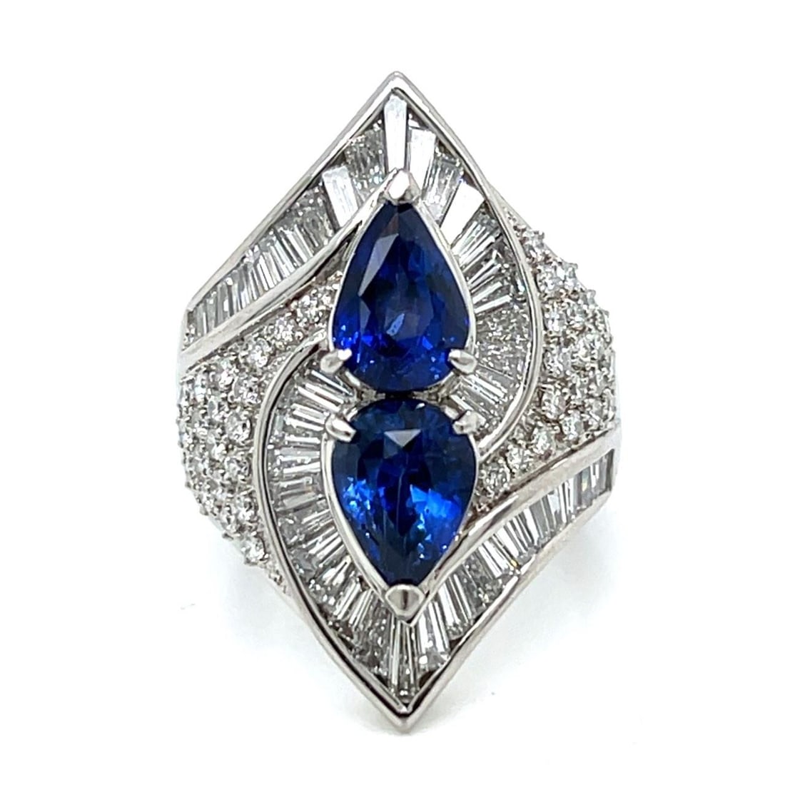Platinum Sapphire Diamond Ring 4.09 Ct Sapphires 2.59 Ct Diamonds: Platinum Sapphire Diamond Ring 4.09 Ct Sapphires 2.59 Ct Diamonds This exquisite Platinum Sapphire & Diamond Ring features a total weight of 24.2 grams. The ring is adorned with two stunning sapphires
