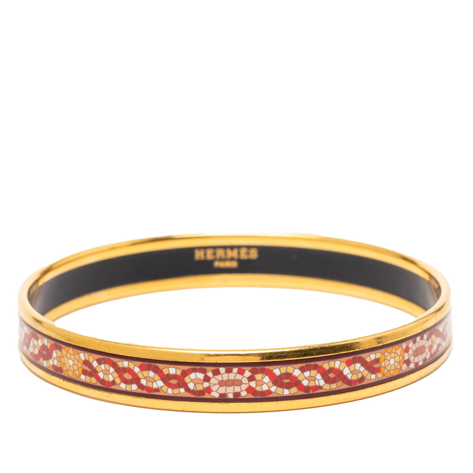 Hermes Mosaic Geometric Enamel Bracelet Orange Gold Tone Size 65: Hermes Mosaic Geometric Enamel Bracelet Orange Gold Tone Size 65 This Hermes bangle features a narrow mosaic-style geometric pattern in orange, crafted from printed enamel and gold-tone metal. The bra