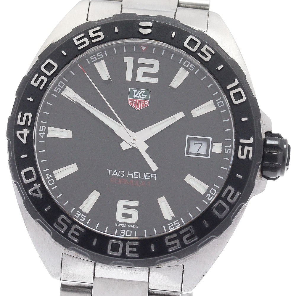 TAG Heuer Formula 1 WAZ1110 Quartz Date Steel Watch: TAG Heuer Formula 1 WAZ1110 Quartz Date Steel Watch This TAG Heuer Formula 1 WAZ1110 men's wristwatch features a black dial with date display and is powered by a reliable quartz movement. The watch ha