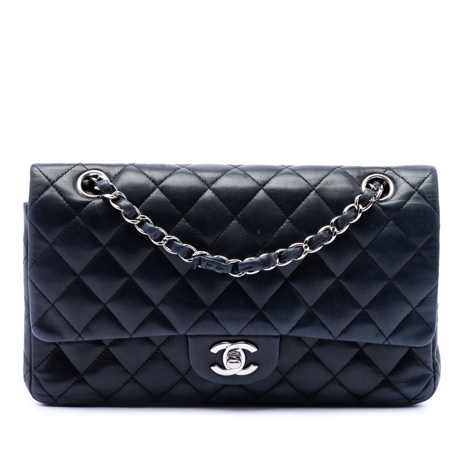 Chanel black quilted lambskin flap shoulder bag: Chanel black quilted lambskin flap shoulder bag This Chanel Medium Classic Lambskin Double Flap shoulder bag features a quilted lambskin leather body, leather-woven chain straps, double front flaps wi
