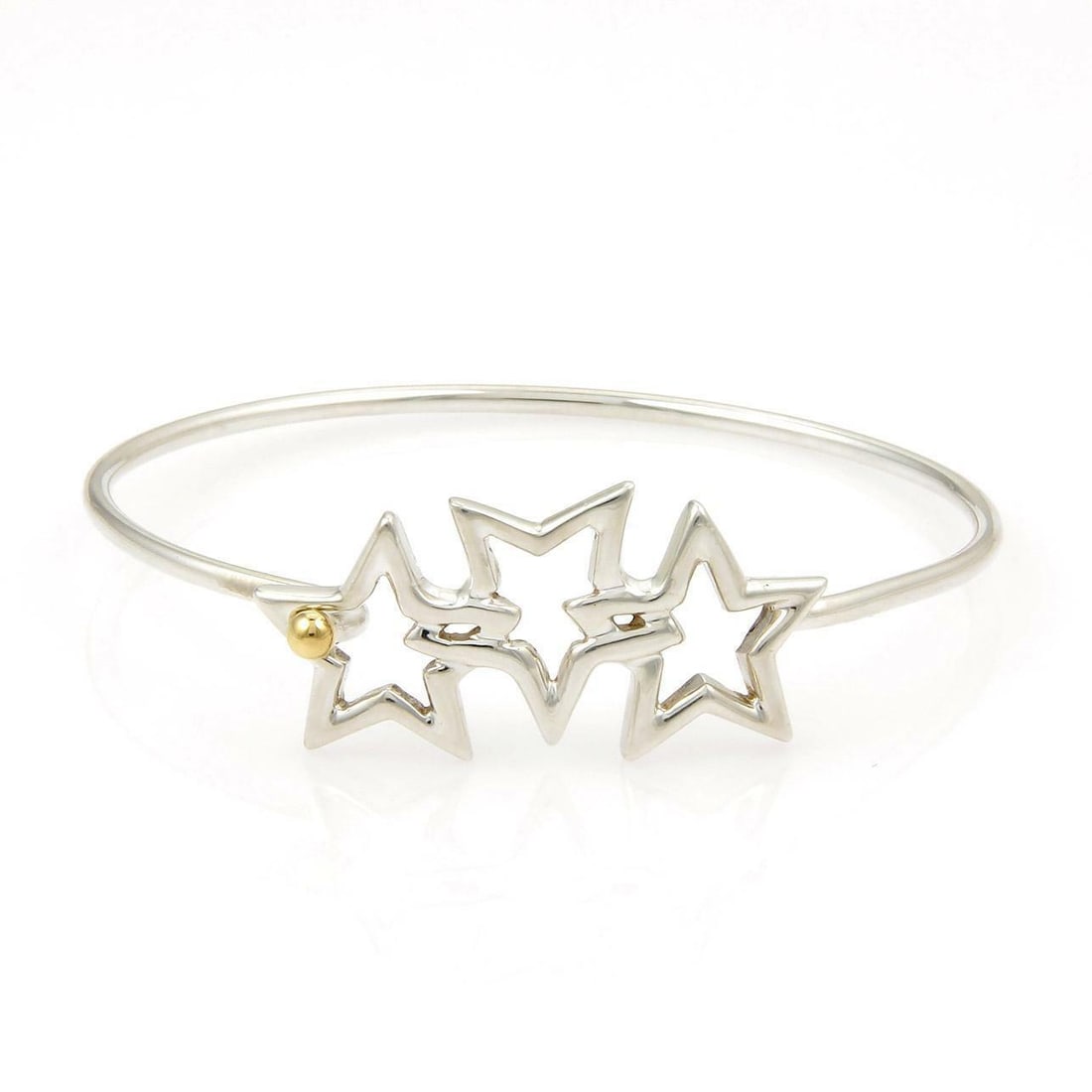 Tiffany & Co. Vintage 3 Stars Sterling Silver 18k Gold Bracelet: Tiffany & Co. Vintage 3 Stars Sterling Silver 18k Gold Bracelet This exquisite vintage bracelet from Tiffany & Co. showcases a captivating design combining 925 sterling silver and 18k yellow gold. The