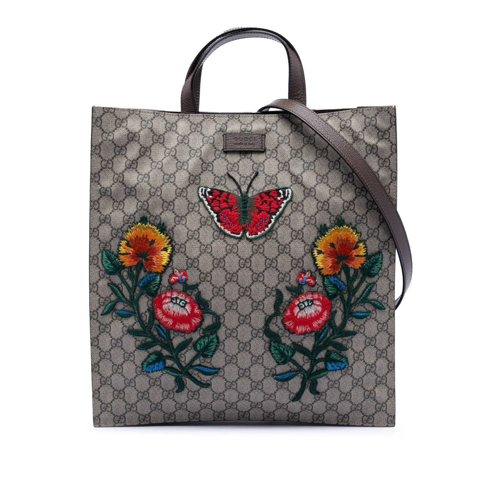 Embroidered GG Supreme Tote with Butterfly and Floral Motif by Gucci: Embroidered GG Supreme Tote with Butterfly and Floral Motif by Gucci This Gucci GG Supreme Butterfly and Flower Embroidery Convertible Soft Tote features an embroidered coated canvas body with butterf