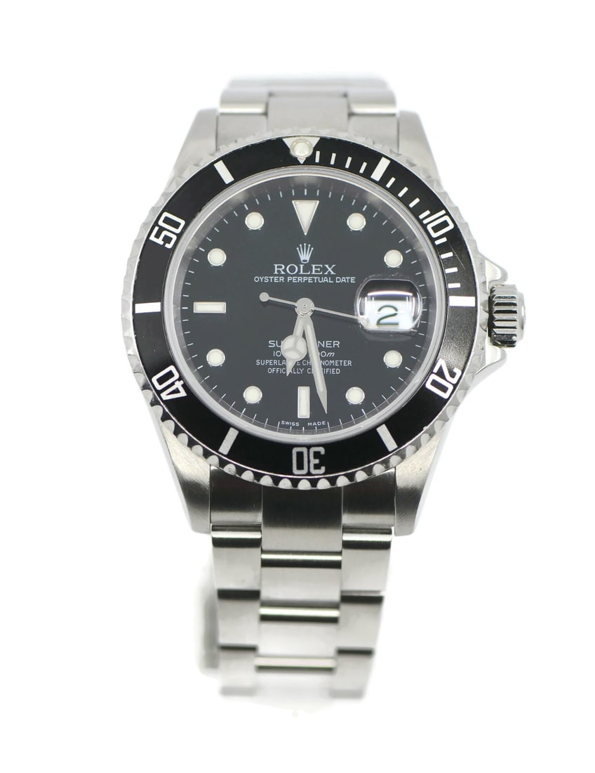 Rolex Submariner 16610 Black Dial 40 mm Automatic Watch: Rolex Submariner 16610 Black Dial 40 mm Automatic Watch This Rolex Submariner 16610 is a classic men's wristwatch featuring a stainless steel case and band. It has a black bezel and black dial, with a