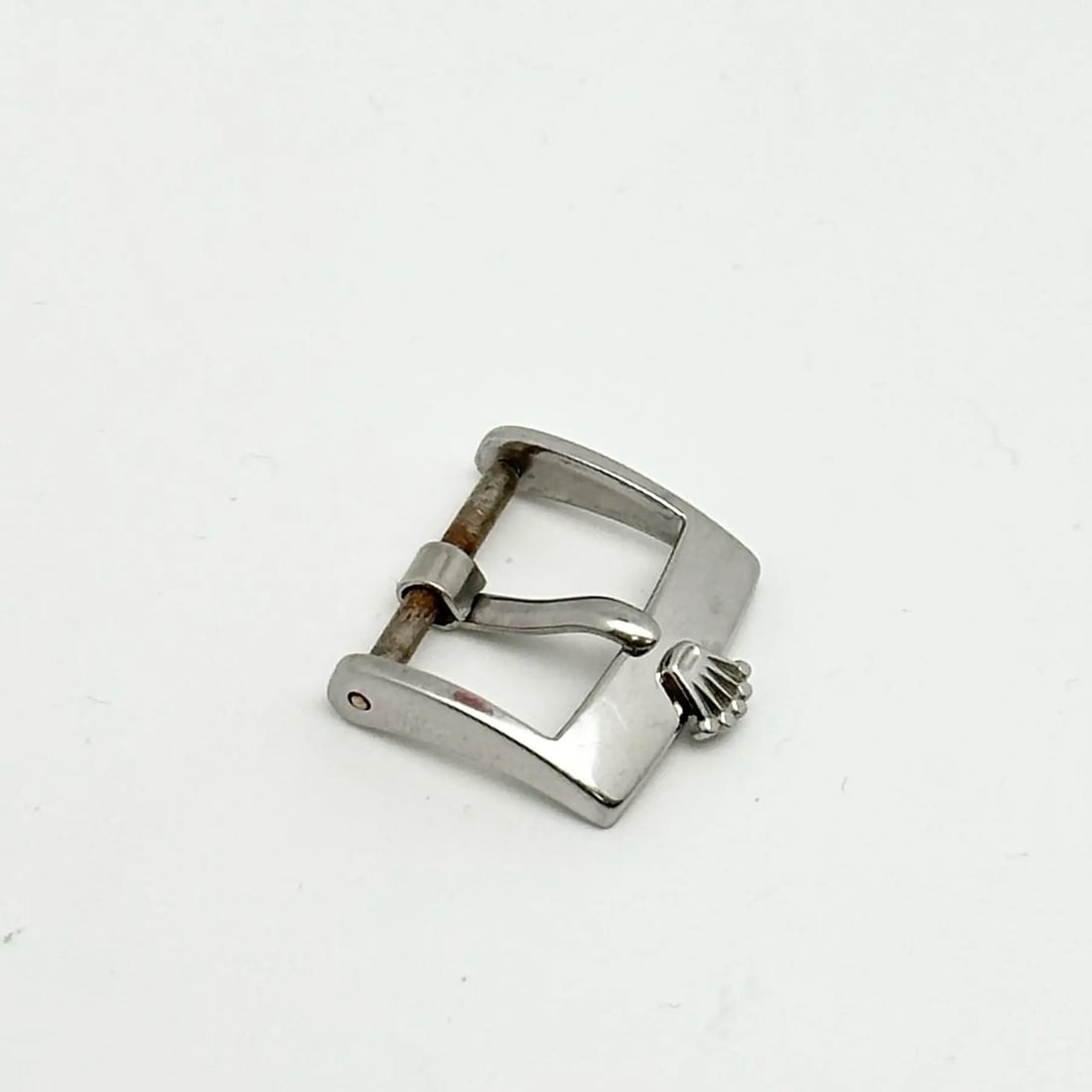 Rolex 14mm Stainless Steel Luxury Buckle for Leather Watch Strap: Rolex 14mm Stainless Steel Luxury Buckle for Leather Watch Strap This is an authentic Rolex stainless steel buckle, designed for use with a 14mm leather band. It is suitable for luxury watch models co