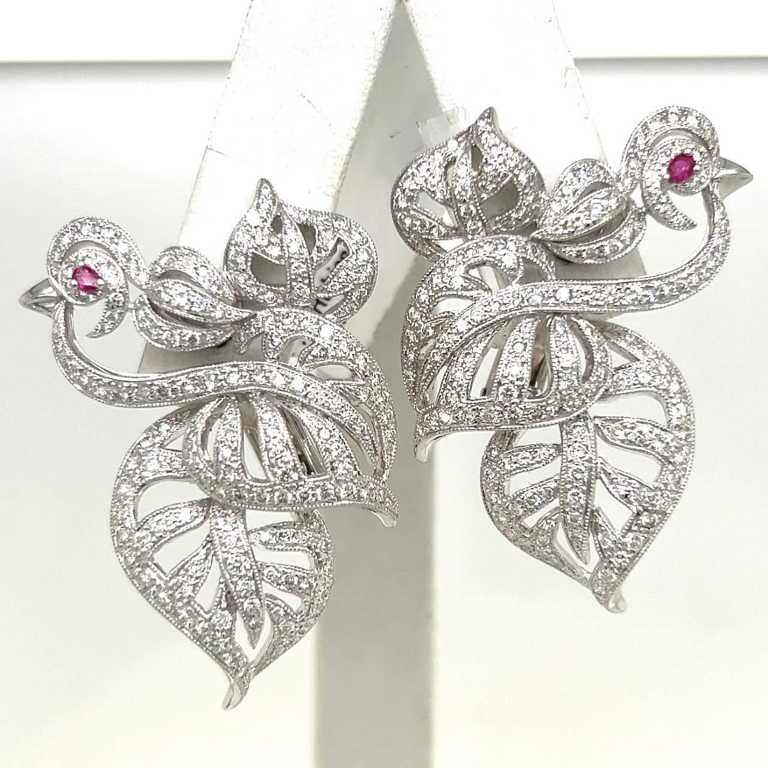 Stunning 18K White Gold Diamond Ruby Earrings 4.00 Ct F-G VVS-VS 1.5 Inches: Stunning 18K White Gold Diamond Ruby Earrings 4.00 Ct F-G VVS-VS 1.5 Inches Adorn yourself with these exquisite Diamond & Ruby Earrings, crafted from luxurious 18K white gold. These stunning earrings 