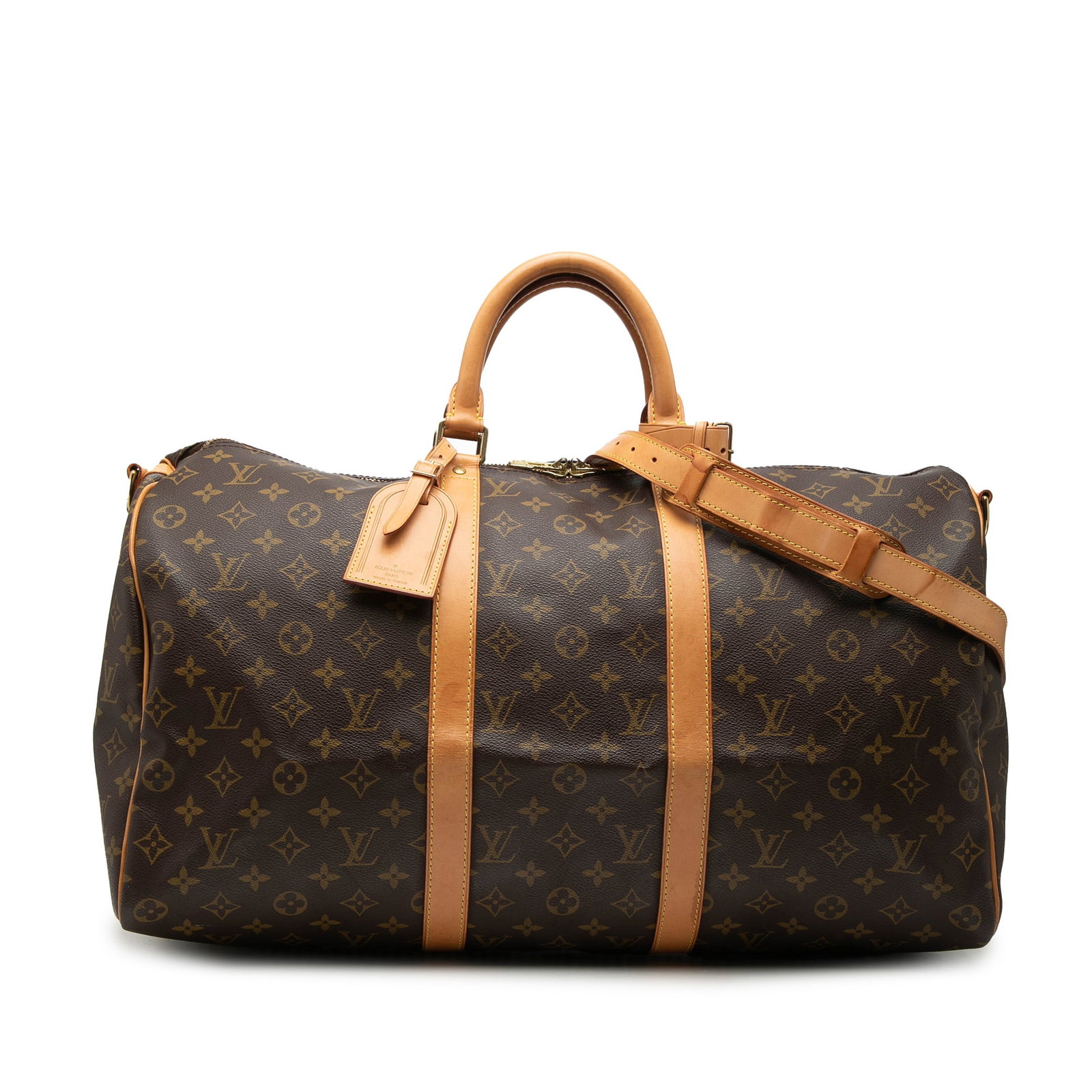 Louis Vuitton Monogram Keepall 50 Bandouliere Travel Bag: Louis Vuitton Monogram Keepall 50 Bandouliere Travel Bag The Louis Vuitton Monogram Keepall Bandouliere 50 is a spacious travel bag crafted from signature monogram canvas with rolled vachetta leather 