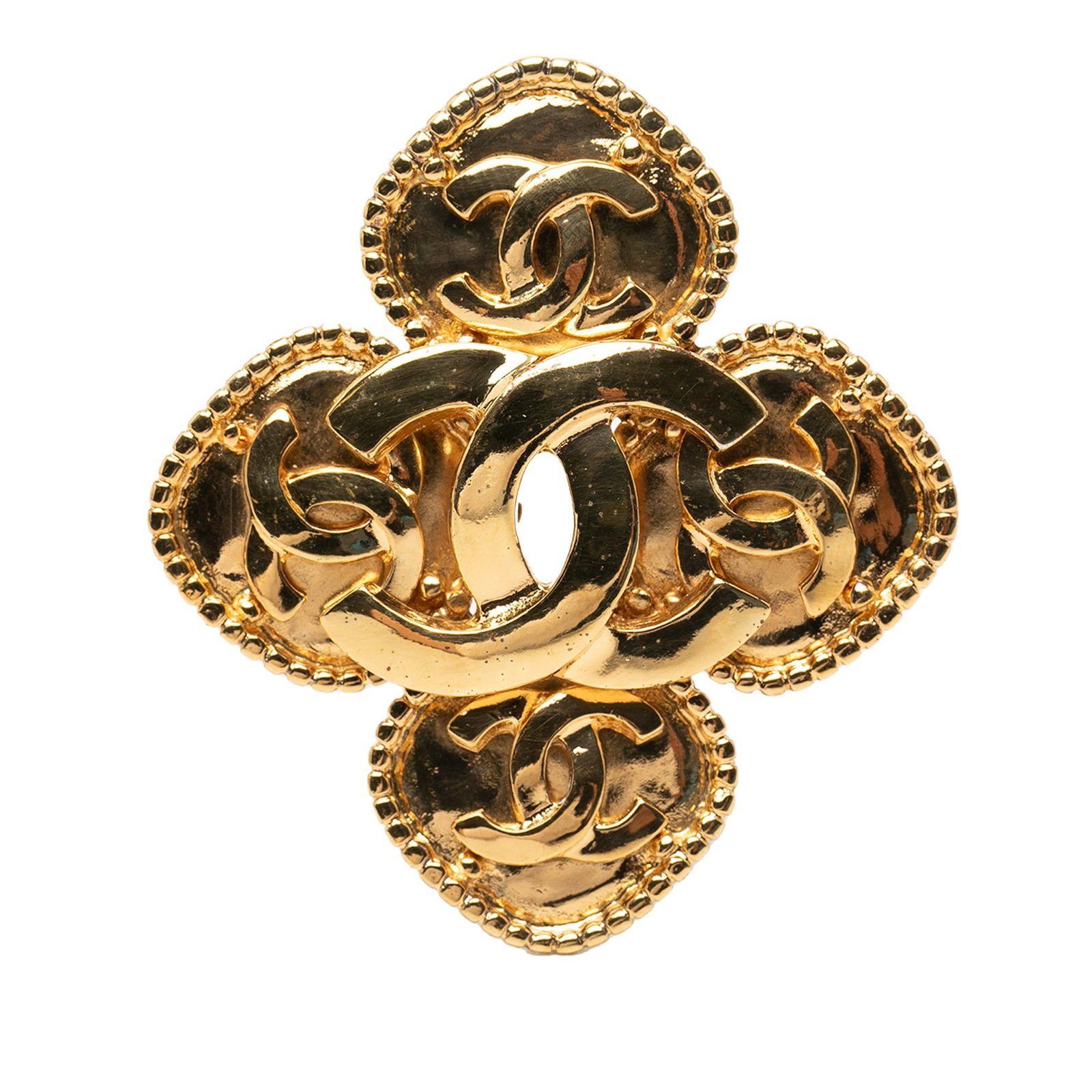 Chanel Gold Plated Flower Brooch CC Logo Pin Back: Chanel Gold Plated Flower Brooch CC Logo Pin Back This Chanel brooch showcases a gold-plated metal design in a floral motif, featuring the iconic CC logo and a pin back closure. Made in France, this p