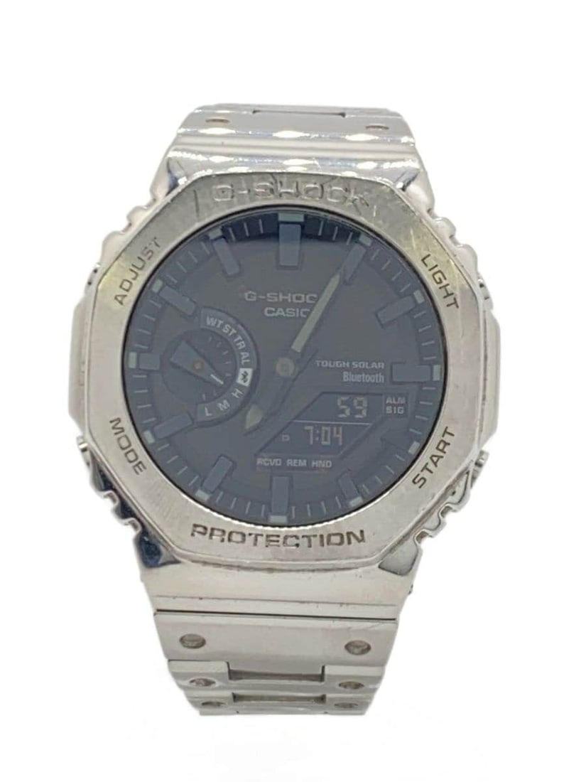 Casio G Shock GM-B2100D-1AJF Black Men's Wristwatch: Casio G Shock GM-B2100D-1AJF Black Men's Wristwatch This CASIO G-SHOCK GM-B2100D-1AJF men's wristwatch features a stylish black design and is crafted in Japan. The watch shows slight signs of use, wit