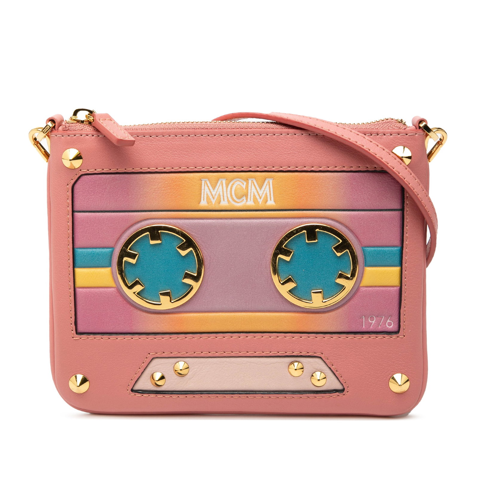 MCM Pink Leather Cassette Tape Crossbody Bag with Adjustable Strap: MCM Pink Leather Cassette Tape Crossbody Bag with Adjustable Strap This crossbody bag features a pink leather body with a design inspired by cassette tapes. It includes a detachable and adjustable fla