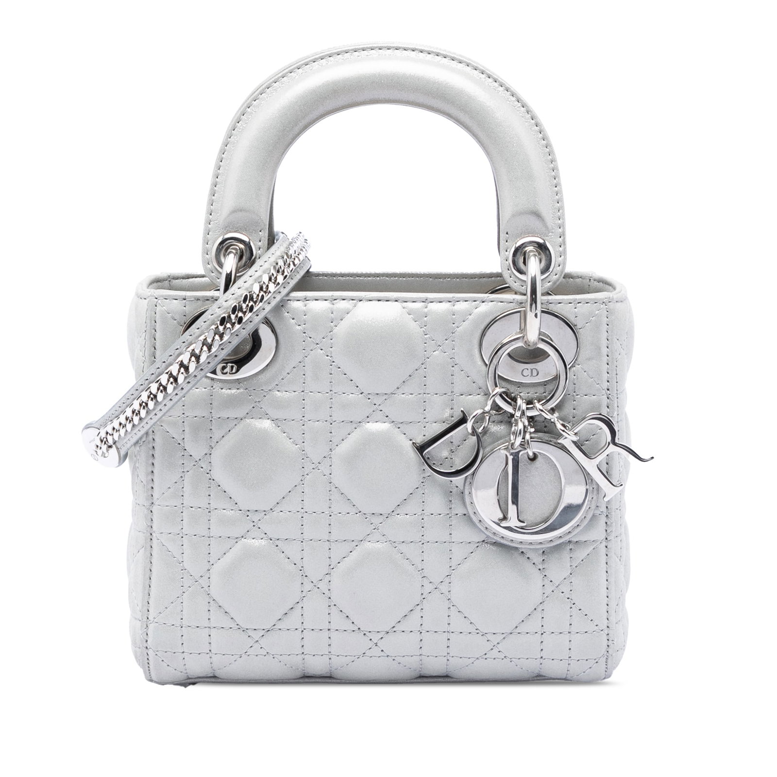 Dior Mini Cannage Lady handbag iridescent lambskin: Dior Mini Cannage Lady handbag iridescent lambskin This Mini Iridescent Lambskin Cannage Lady Dior bag features a quilted iridescent lambskin leather body in silver, complemented by flat leather top h