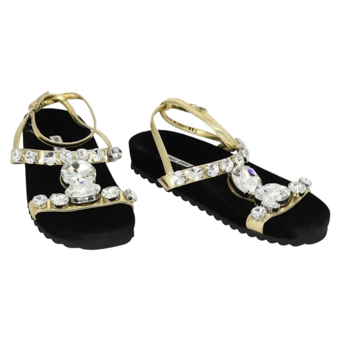 Black Leather Sandals by Miu Miu with Dust Bag: Black Leather Sandals by Miu Miu with Dust Bag These Miu Miu sandals feature a black leather and suede upper, offering a stylish and versatile design. Made in Italy, they come with an approximate tota