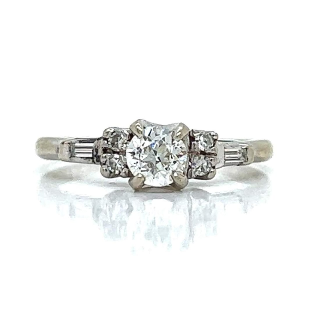 14K White Gold Diamond Ring with European-Cut Center Stone: 14K White Gold Diamond Ring with European-Cut Center Stone This stunning 14K white gold diamond ring features a captivating European-cut diamond weighing approximately 0.40 Ct, showcasing H-I color an