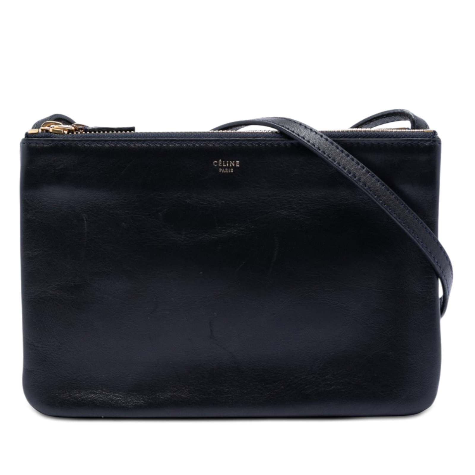 Celine Trio Blue Lambskin Crossbody Bag: Celine Trio Blue Lambskin Crossbody Bag This Celine Small Lambskin Trio Crossbody bag is crafted from blue lambskin leather and features an adjustable flat leather strap with three top zip closures. T