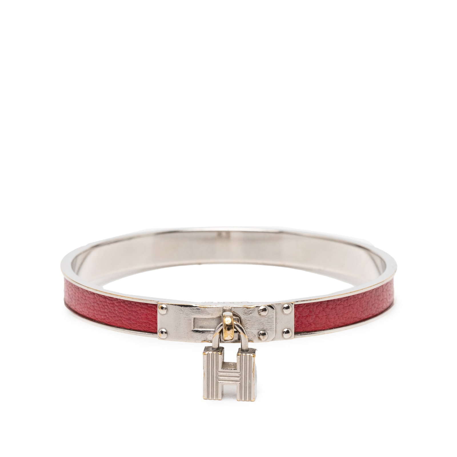 Hermes Kelly H Cadena Red Leather Bangle with Palladium Hardware: Hermes Kelly H Cadena Red Leather Bangle with Palladium Hardware This Hermes Kelly H Cadena Lock bangle bracelet features a red leather band paired with palladium-plated metal hardware. The bracelet i
