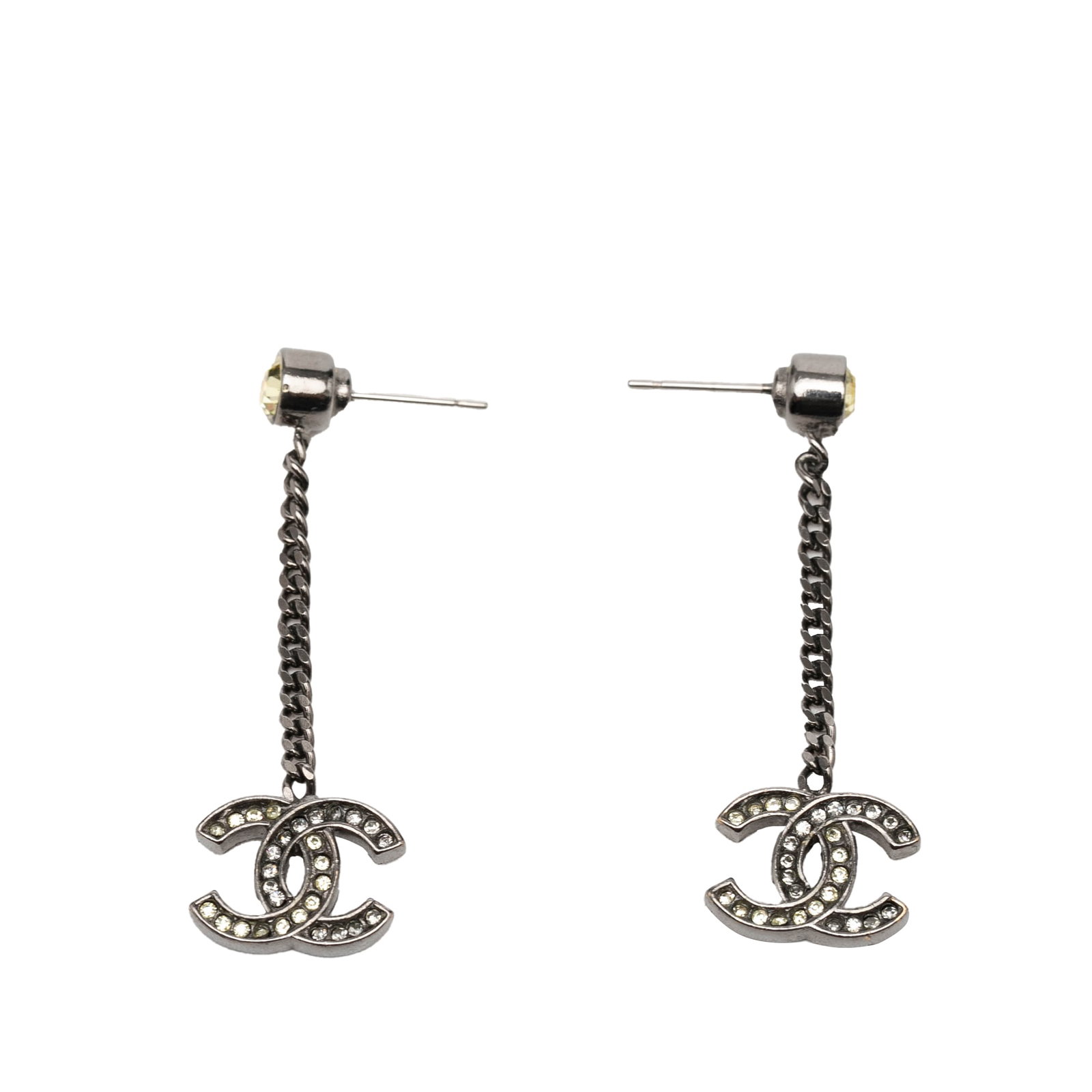 Chanel Silver Plated CC Swing Earrings with Strass: Chanel Silver Plated CC Swing Earrings with Strass These Chanel earrings feature silver-plated metal bodies adorned with chain and strass embellishments, offering a distinctive swing design. The earri