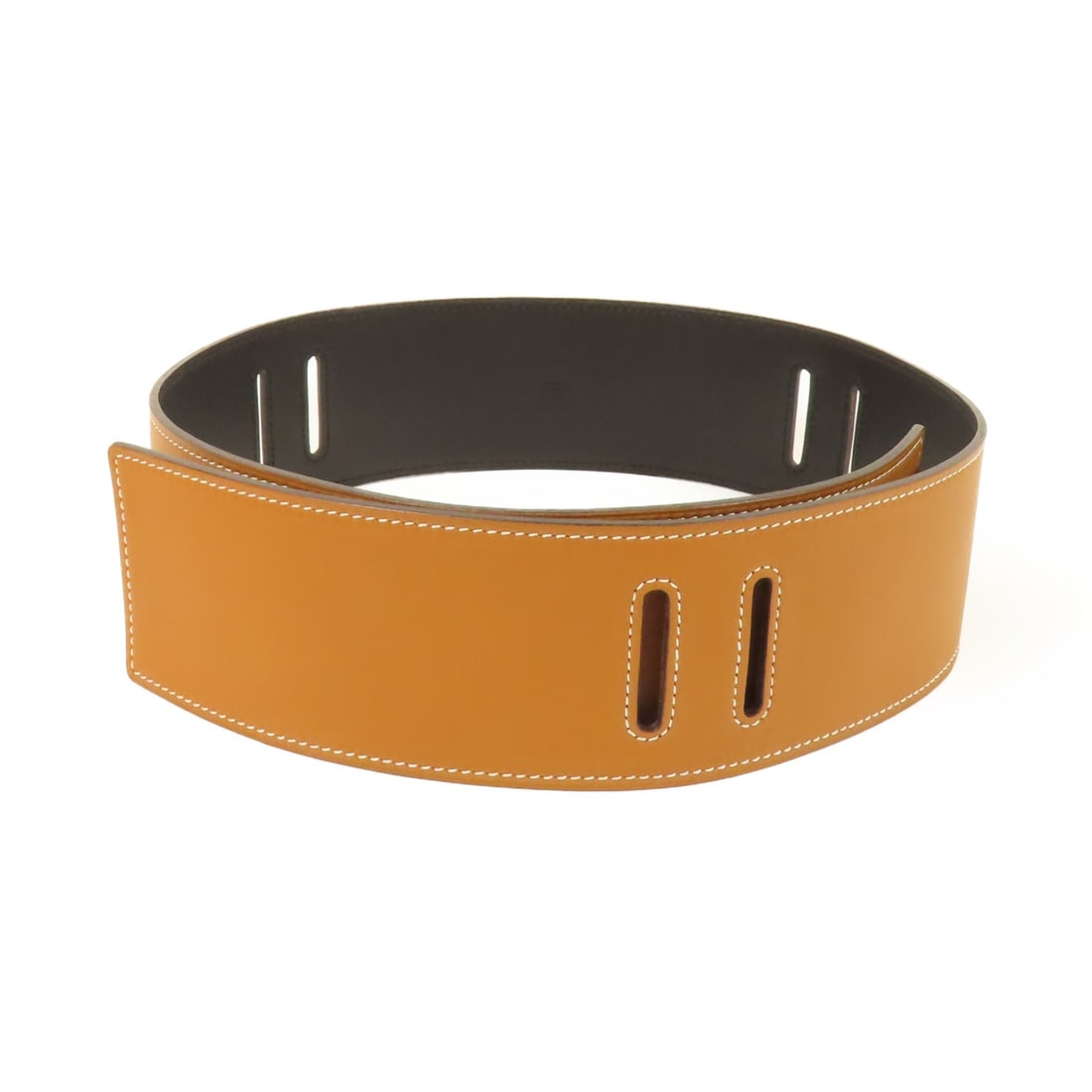 Brown Swift Calfskin Belt by Hermes for Women: Brown Swift Calfskin Belt by Hermes for Women This Hermes women's belt is crafted from swift calfskin leather in a brown color. Made in France, it features a classic style suitable for regular sizing 