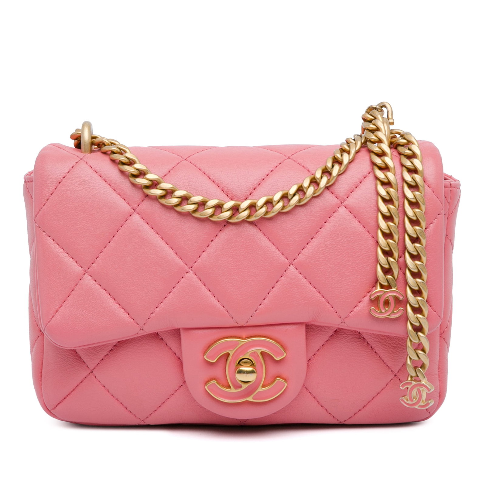 Chanel Mini Lambskin Pending CC Flap Pink Crossbody Bag: Chanel Mini Lambskin Pending CC Flap Pink Crossbody Bag This exquisite Chanel Mini Lambskin Pending CC Flap crossbody bag is crafted from luxurious quilted lambskin leather in a charming pink hue. It 