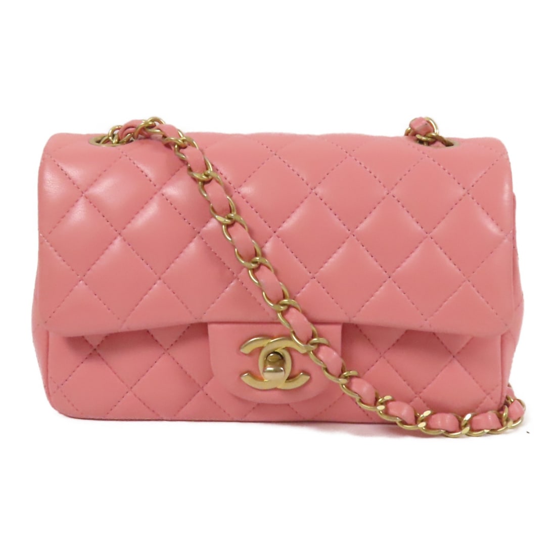 CHANEL pink lambskin Classic 20 CC chain shoulder bag GHW: CHANEL pink lambskin Classic 20 CC chain shoulder bag GHW This CHANEL Classic 20 chain shoulder bag features the iconic CC design and is crafted from luxurious pink lambskin leather. It has a gold-ton
