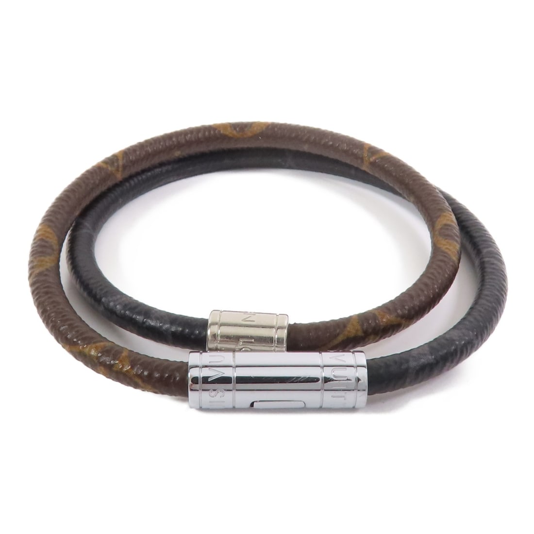 Keep It Double Bracelet by Louis Vuitton in Monogram Macassar Eclipse Black: Keep It Double Bracelet by Louis Vuitton in Monogram Macassar Eclipse Black This Louis Vuitton Keep It Double Bracelet features a stylish design crafted from PVC coated canvas in a brown color. Design