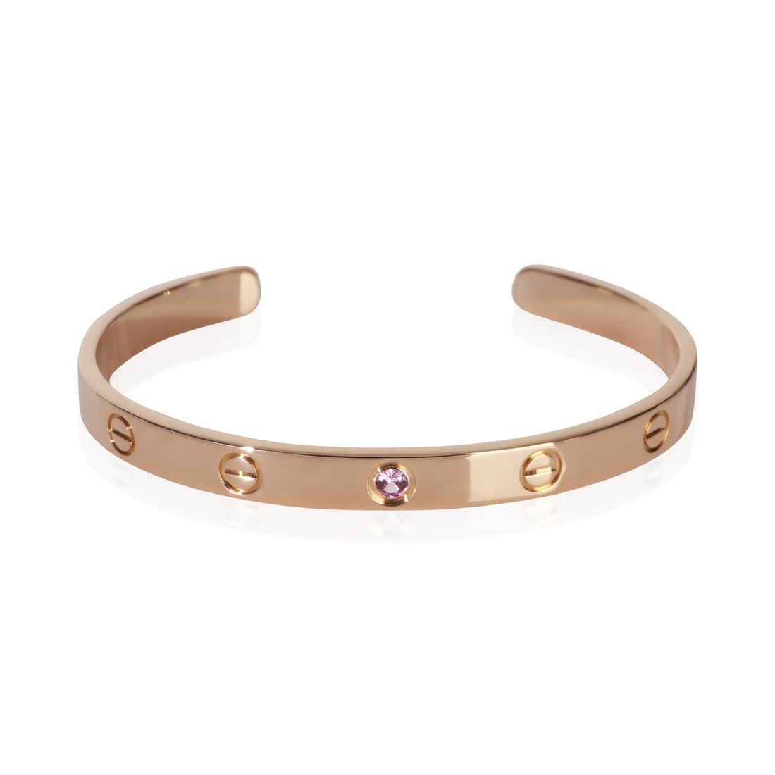Cartier Love Cuff 18k Rose Gold Pink Sapphire Bracelet: Cartier Love Cuff 18k Rose Gold Pink Sapphire Bracelet This Cartier Love Cuff Bracelet is crafted from 18k rose gold and features a striking pink sapphire as its main stone. Designed as part of the re