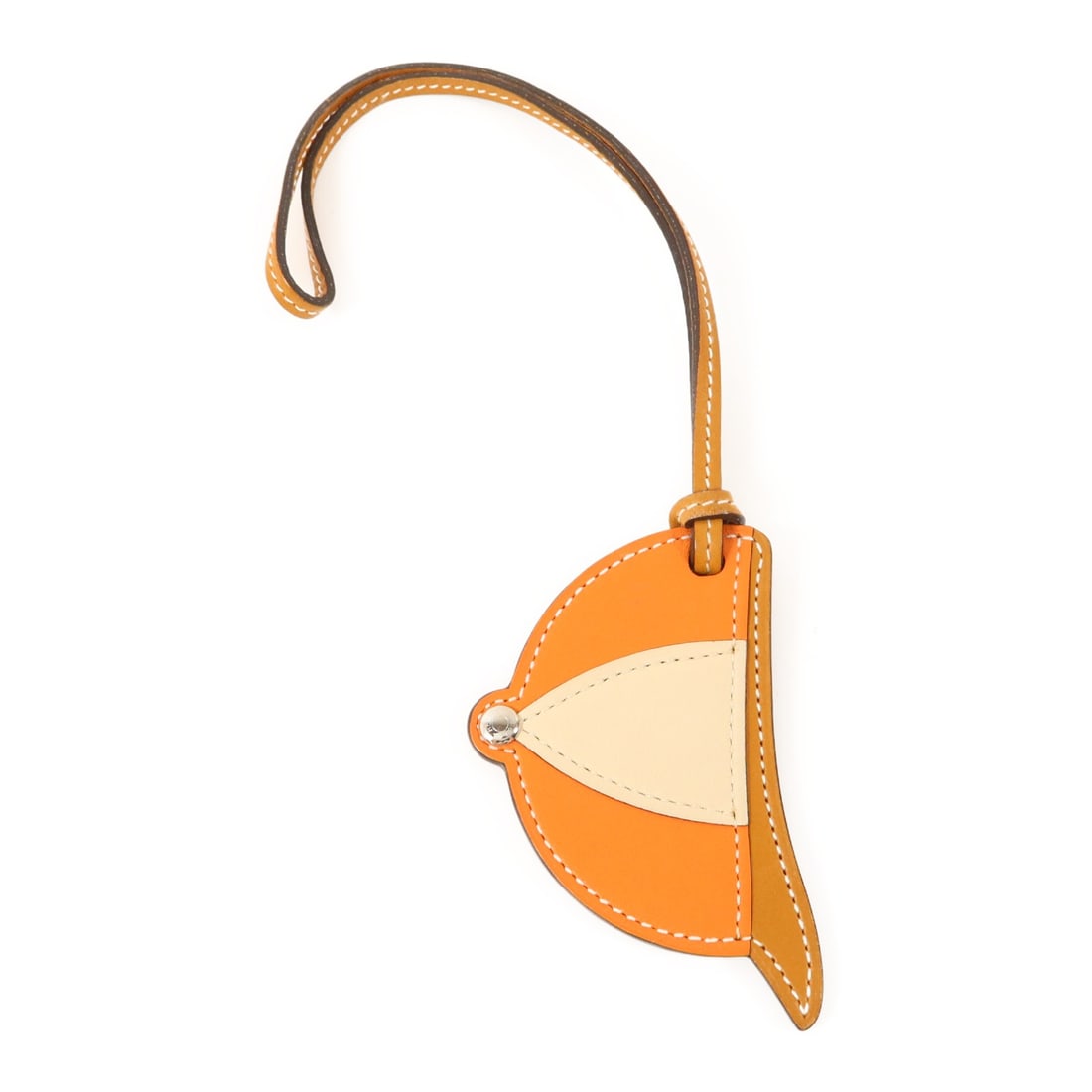 Hermes Paddock Bombe Swift Leather Charm in Brown and Orange with PHW: Hermes Paddock Bombe Swift Leather Charm in Brown and Orange with PHW This Hermes Paddock Bombe charm is crafted from Swift calfskin leather in brown and orange tones. Designed for women, it features 