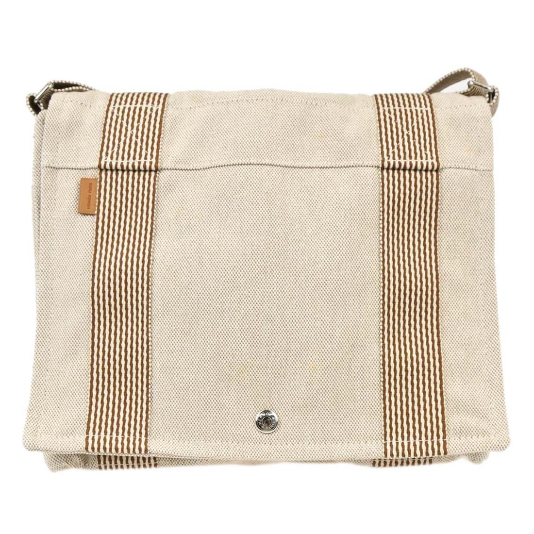 Hermes Fourre Tout Besace PM Beige Canvas Shoulder Bag: Hermes Fourre Tout Besace PM Beige Canvas Shoulder Bag This Hermes Fourre Tout Besace PM shoulder bag features a beige canvas exterior with a signature logo accent and a medium-sized silhouette. The b