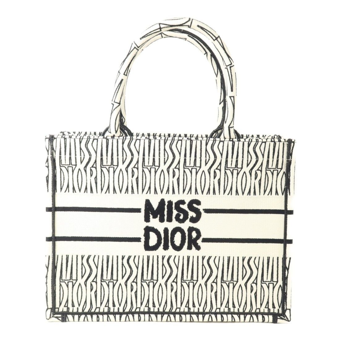 Dior Book Tote Medium Canvas Black White: Dior Book Tote Medium Canvas Black White This Christian Dior CD Book Tote Medium is crafted from durable black and white canvas, offering a stylish and practical accessory for everyday use. Made in Fr
