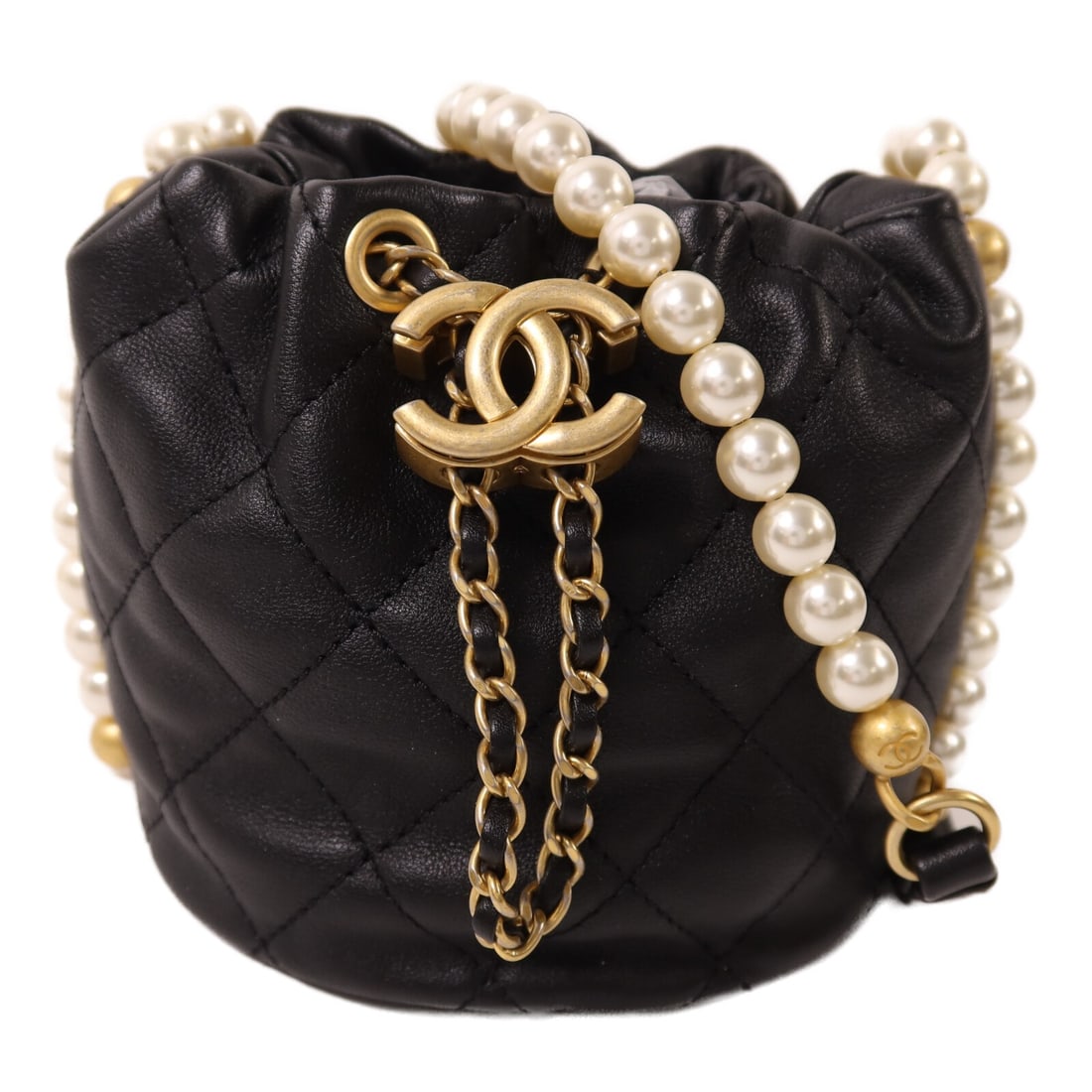 Chanel Mini Pearl Bucket Shoulder Bag Black Calfskin with Gold CC Hardware: Chanel Mini Pearl Bucket Shoulder Bag Black Calfskin with Gold CC Hardware This Chanel CC Mini Pearl Bucket Bag is crafted from black calfskin leather and features gold-tone hardware. Designed in a co