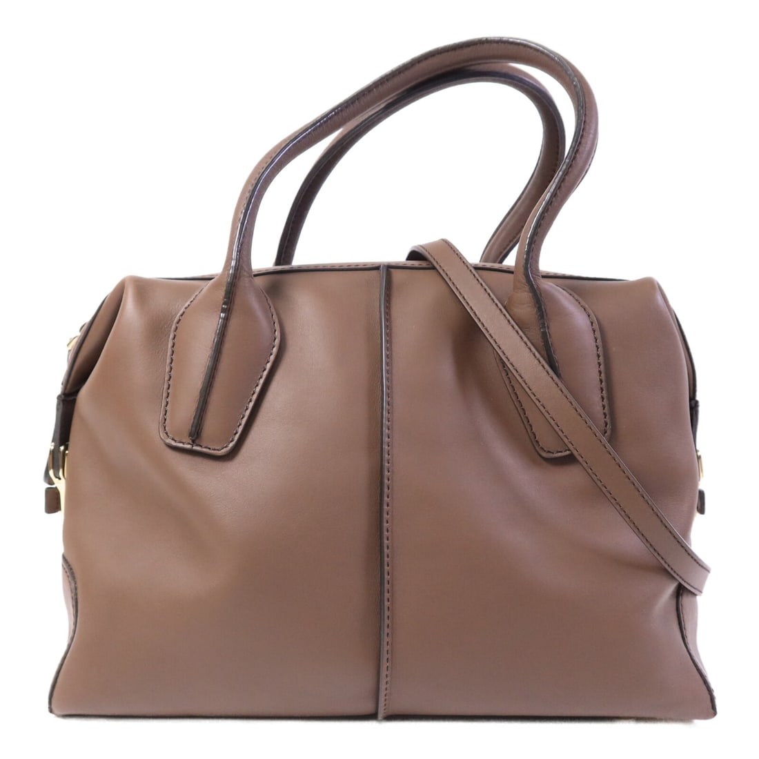 Tods D-Styling Bauletto Medium Brown Calfskin 2 Way Shoulder Bag: Tods D-Styling Bauletto Medium Brown Calfskin 2 Way Shoulder Bag This TOD'S D-Styling Bauletto Medium shoulder bag features a versatile 2-way design, crafted from high-quality brown calfskin leather. 