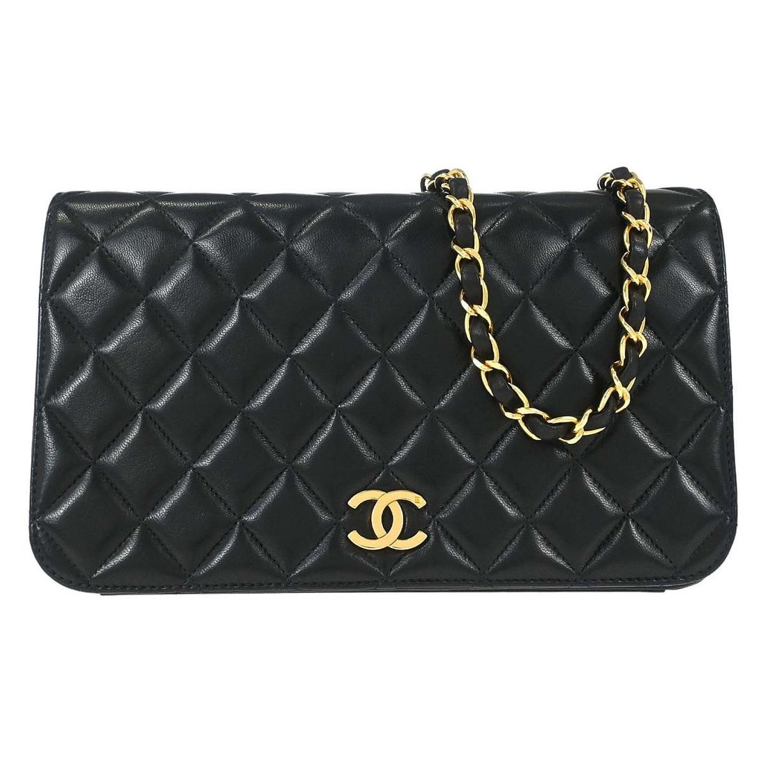 Chanel black lambskin shoulder bag pushlock flap: Chanel black lambskin shoulder bag pushlock flap This Chanel shoulder bag features luxurious black lambskin leather with a classic pushlock closure and a full flap design. It is styled with a logo acc
