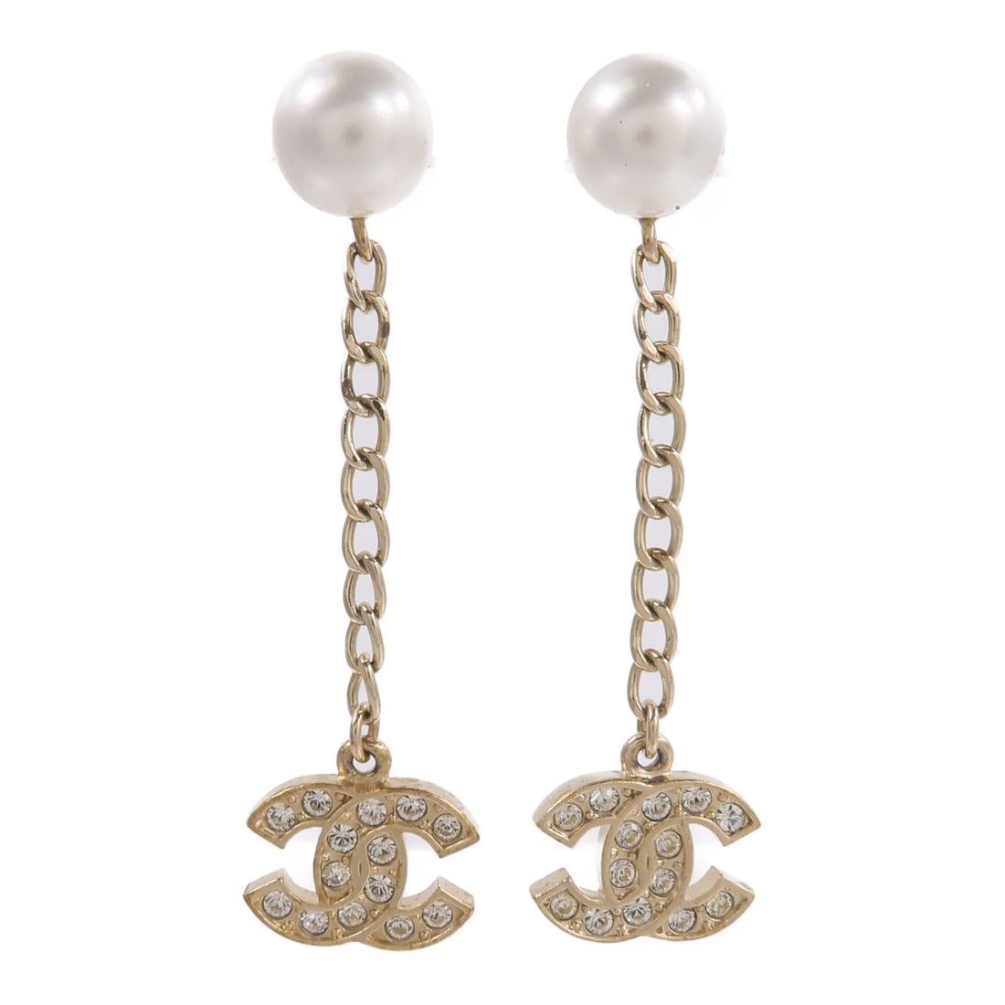 CHANEL Gold CC Crystal Drop Pierced Earrings: CHANEL Gold CC Crystal Drop Pierced Earrings These CHANEL CC crystal dangle piercing earrings feature a gold-tone metal design with the iconic CC logo. Crafted for pierced ears, they offer a sophistic
