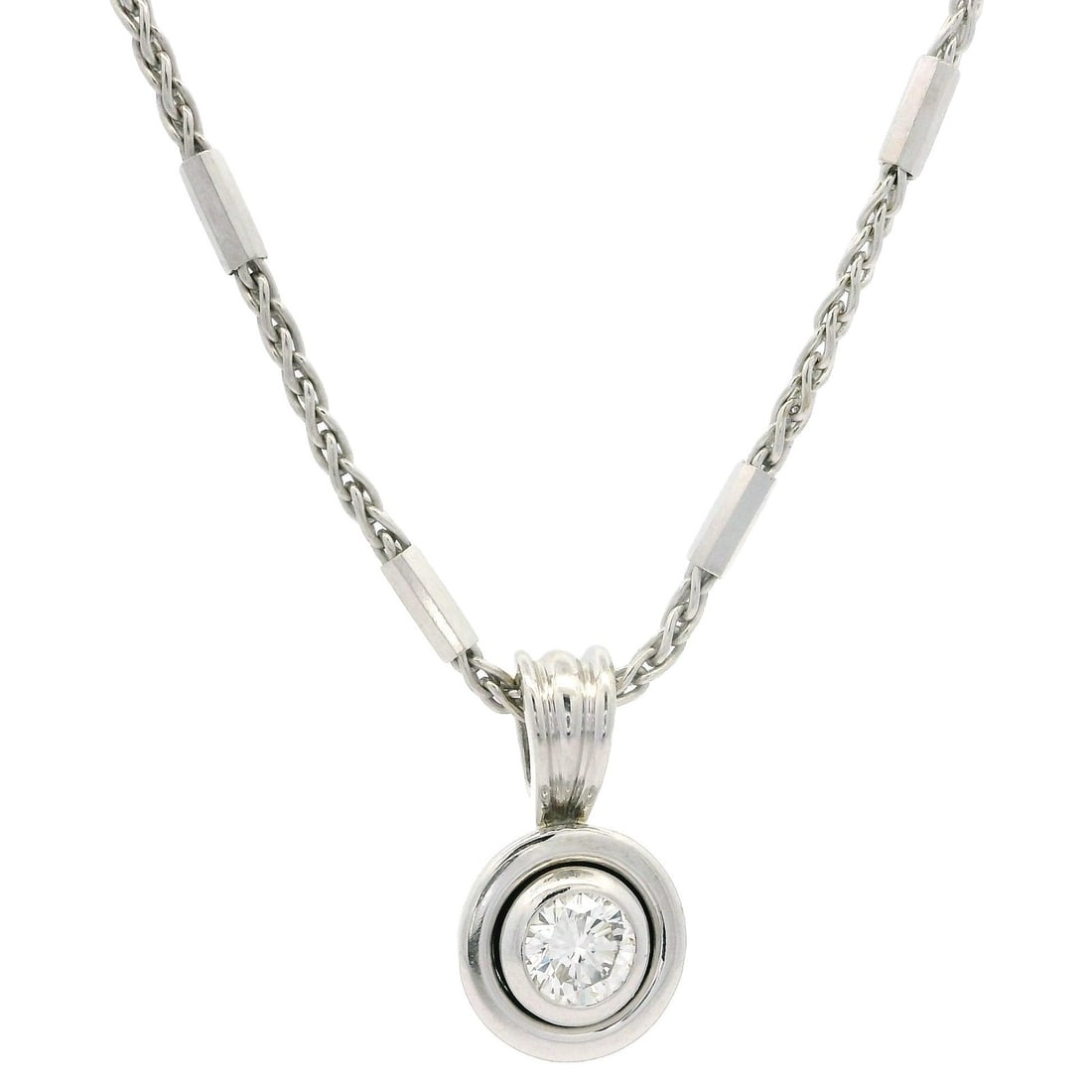 18k White Gold .25ct Diamond Bezel Solitaire Pendant on 15" Chain: 18k White Gold .25ct Diamond Bezel Solitaire Pendant on 15" Chain This exquisite pendant features a solid 18k white gold bezel setting housing a natural round brilliant cut diamond. Weighing approxima