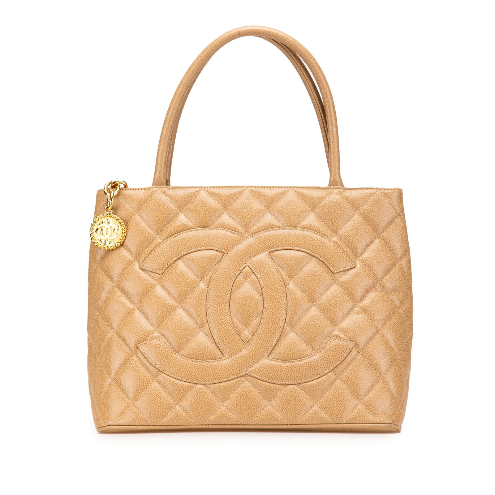 Chanel Caviar Medallion Tote Brown Leather Bag: Chanel Caviar Medallion Tote Brown Leather Bag The Chanel Caviar Medallion Tote exudes elegance with its luxurious quilted caviar leather construction. This stylish tote features rolled leather handle