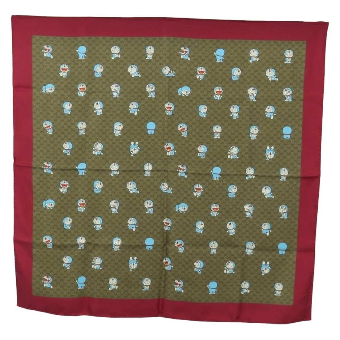 Silk Beige Micro GG Doraemon Scarf for Women by Gucci: Silk Beige Micro GG Doraemon Scarf for Women by Gucci This GUCCI Micro GG Doraemon scarf is crafted from silk in a beige color. Designed for women, it features the iconic Micro GG pattern. The scarf m