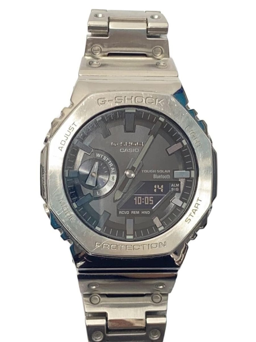 CASIO G SHOCK GM B2100 Black Men's Wristwatch: CASIO G SHOCK GM B2100 Black Men's Wristwatch This CASIO G-SHOCK GM-B2100 men's wristwatch features a black design and is crafted with materials sourced from Japan. The watch is pre-owned and shows sl