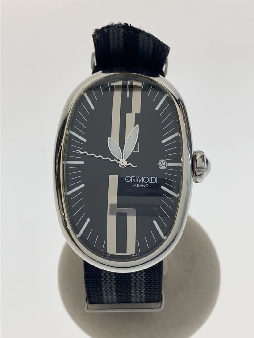 Grimoldi Milano Black Jack Swiss Men's Wristwatch: Grimoldi Milano Black Jack Swiss Men's Wristwatch This GRIMOLDI MILANO Black Jack men's wristwatch features a Swiss-made movement and a distinctive design. The watch shows slight signs of wear and som