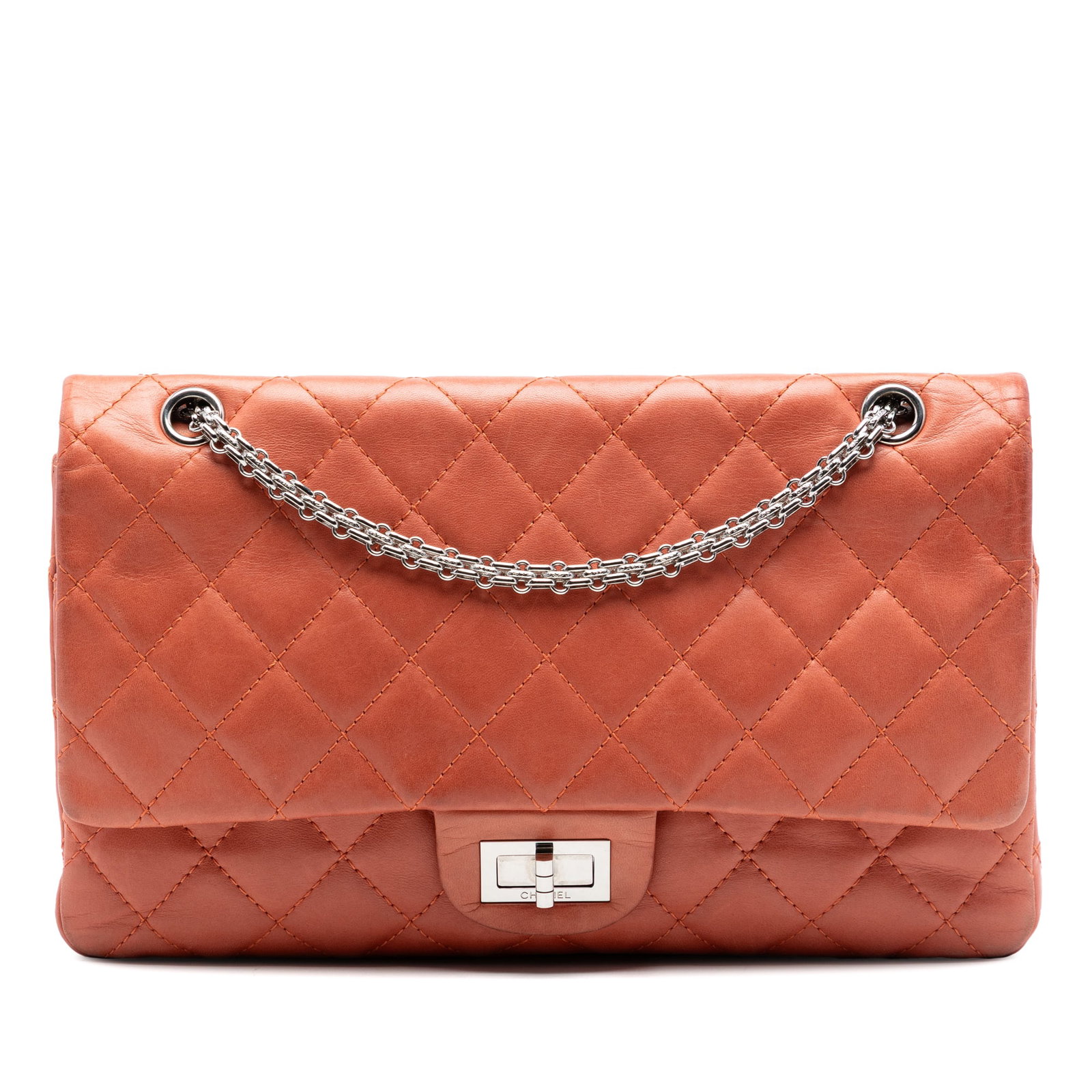 Chanel Reissue 2.55 Double Flap Lambskin Shoulder Bag 227 Orange: Chanel Reissue 2.55 Double Flap Lambskin Shoulder Bag 227 Orange This Chanel Quilted Lambskin Reissue 2.55 Double Flap 227 shoulder bag features a luxurious lambskin leather body in orange, complement