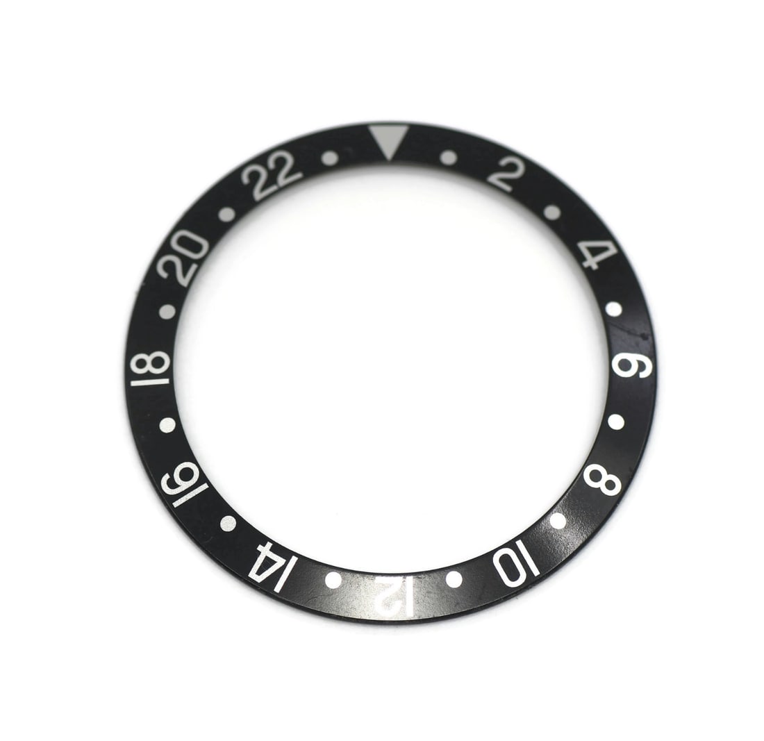 Rolex GMT-Master 16710 Insert: Rolex GMT-Master 16710 Insert This is a pre-owned Rolex GMT-Master insert, model 16710. Manufactured in Switzerland, this authentic insert is designed for compatibility with the Rolex GMT-Master. It i