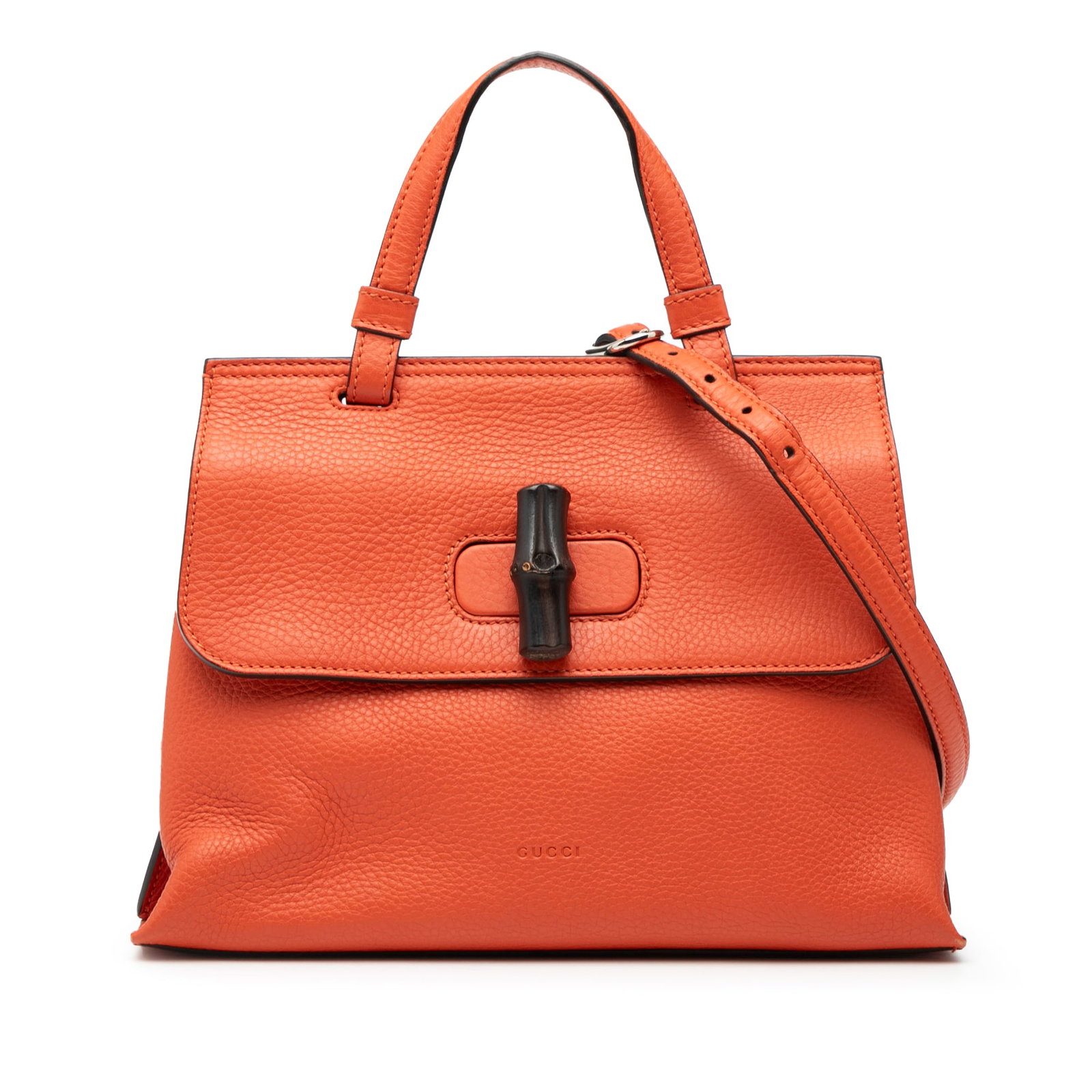 Gucci orange leather Bamboo Daily satchel: Gucci orange leather Bamboo Daily satchel This Gucci Small Leather Bamboo Daily Satchel features an orange leather body with a flat top handle and a detachable flat leather strap. The bag is designed 