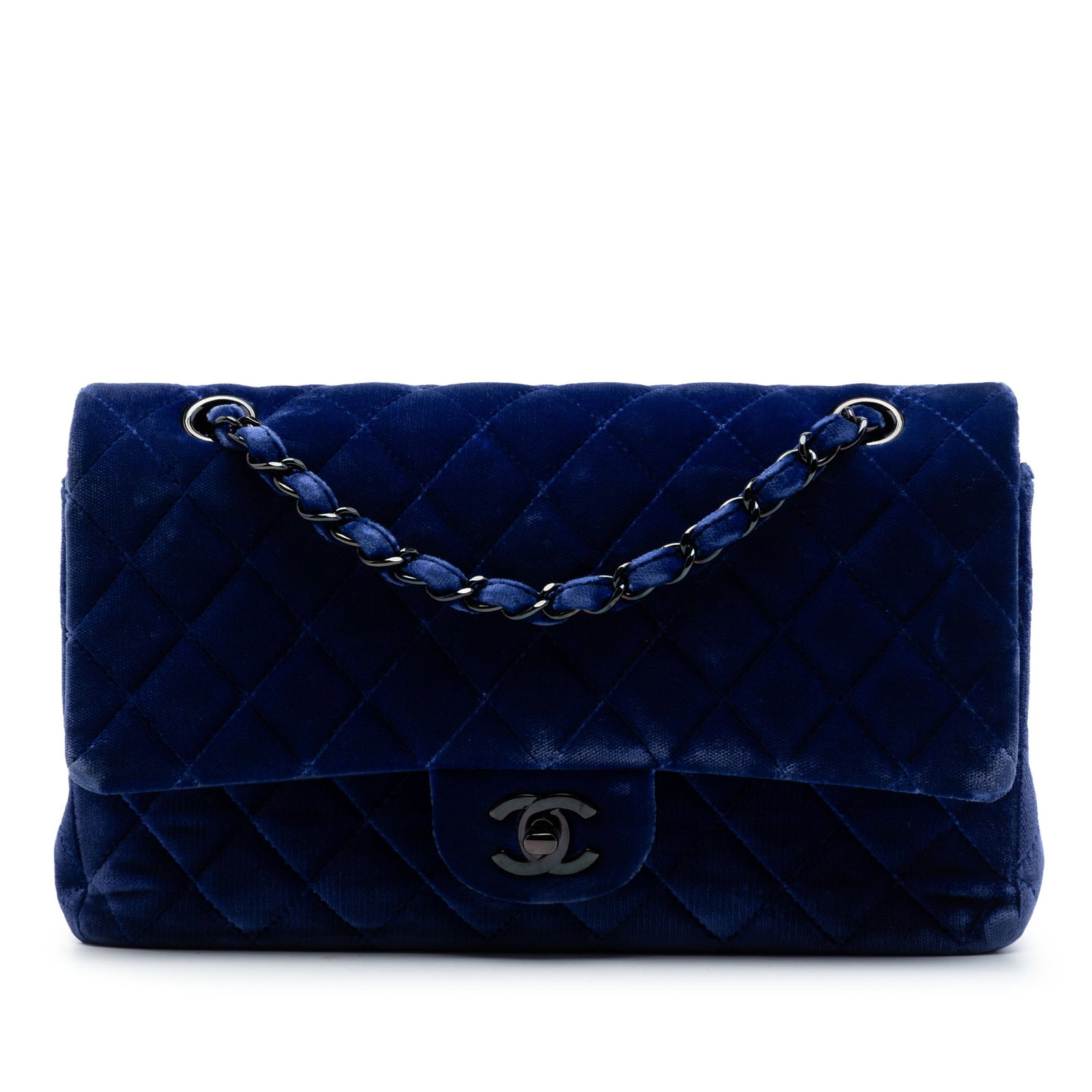Chanel blue velvet double flap shoulder bag: Chanel blue velvet double flap shoulder bag This Chanel Medium Classic Velvet Double Flap shoulder bag features a quilted velvet body in blue, complemented by leather-woven chain link straps. It is de