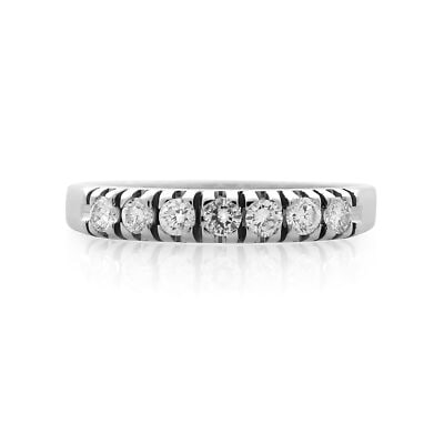 Rachel Koen 14K White Gold Diamond Band Ring 7.5 0.21 cttw: Rachel Koen 14K White Gold Diamond Band Ring 7.5 0.21 cttw This elegantly crafted wedding band features a delicate row of seven pave-set diamonds along the top, creating a refined line of brilliance. 