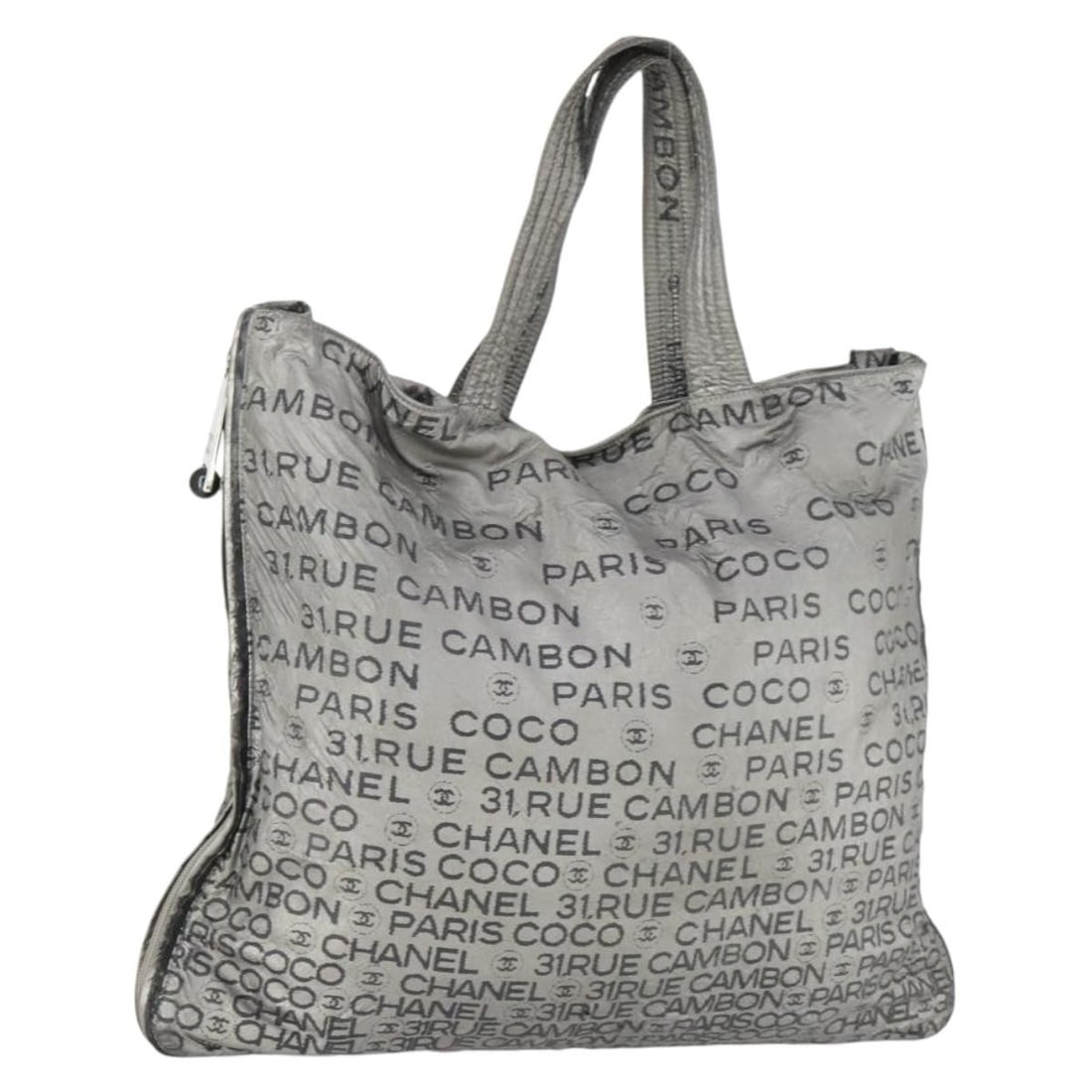 Silver Coated Canvas Tote CHANEL Unlimited Collection Bag: Silver Coated Canvas Tote CHANEL Unlimited Collection Bag This CHANEL Unlimited Tote Bag features a silver coated canvas exterior and is designed for women. Made in Italy, the tote showcases the iconi