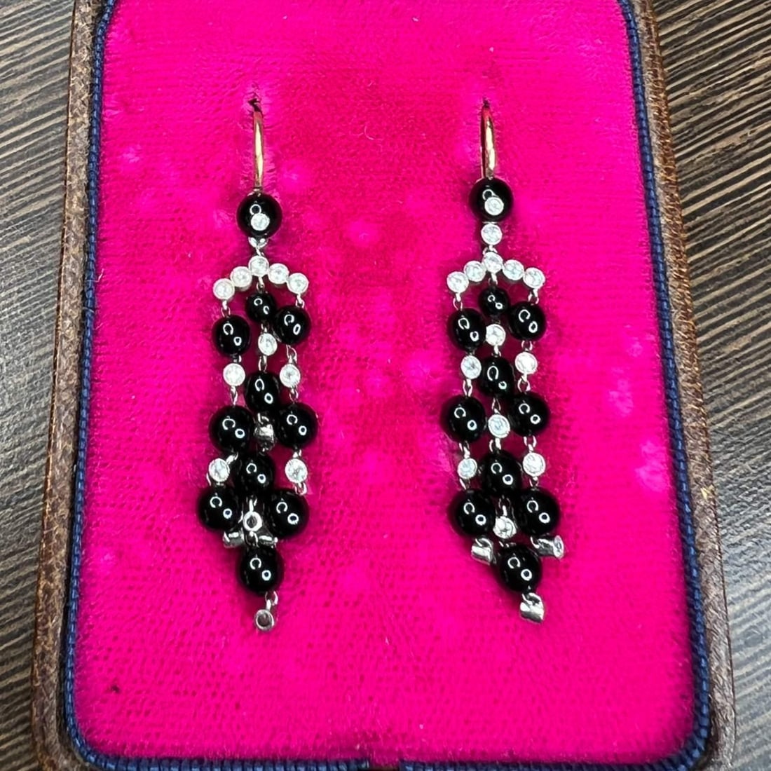 Art Deco Platinum 18K Gold Diamond Onyx Earrings with Original Box: Art Deco Platinum 18K Gold Diamond Onyx Earrings with Original Box Experience the elegance of these Art Deco earrings, crafted from platinum and 18K gold. Adorned with 34 diamonds totaling approximate