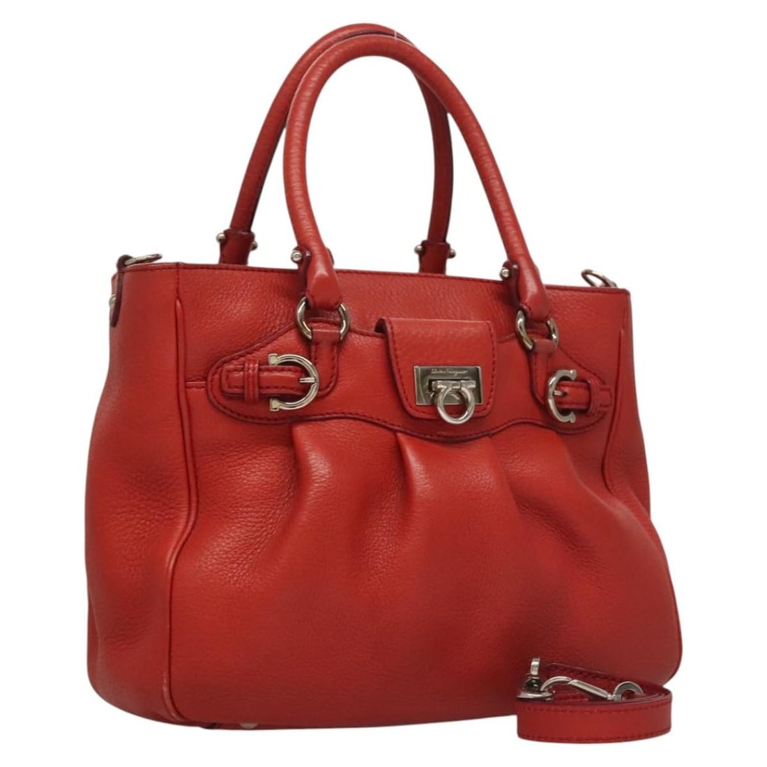 Salvatore Ferragamo Gancini Red Leather Convertible Shoulder Handbag: Salvatore Ferragamo Gancini Red Leather Convertible Shoulder Handbag This Salvatore Ferragamo Gancini 2-way handbag is crafted in red leather with silver-tone accents. It features both a top handle an